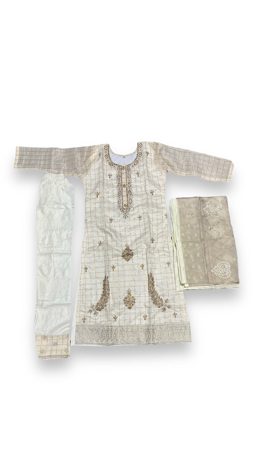 Traditional cotton salwar kameez set for girls, ethnic wear by Saree Ghor Charlotte, featuring colorful fabric and detailed embroidery.