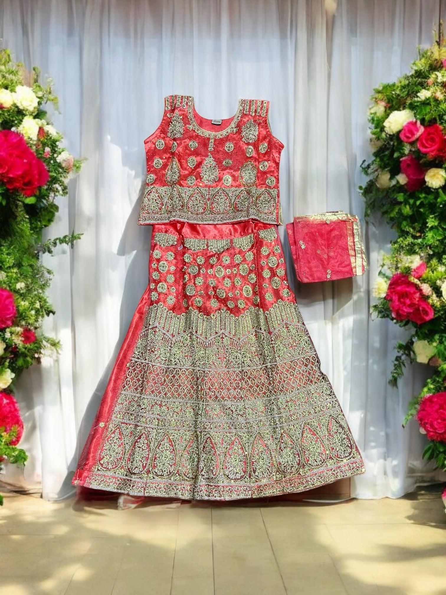 Traditional girls' Lehenga Choli set for kids, ethnic wear by Saree Ghor Charlotte, featuring colorful fabric and intricate embroidery.