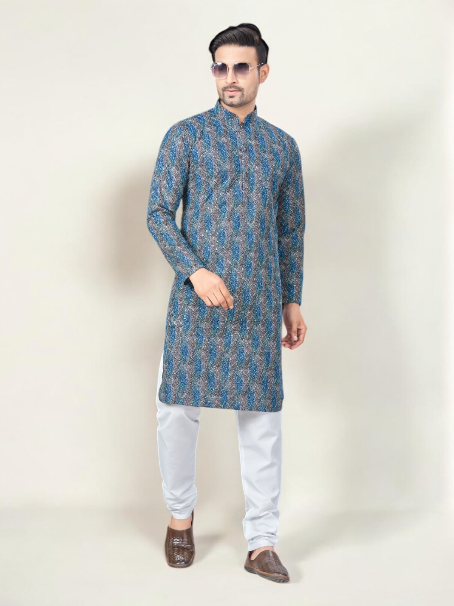 Blue traditional men's kurta and pajama set by Saree Ghor Charlotte, featuring classic ethnic wear design.