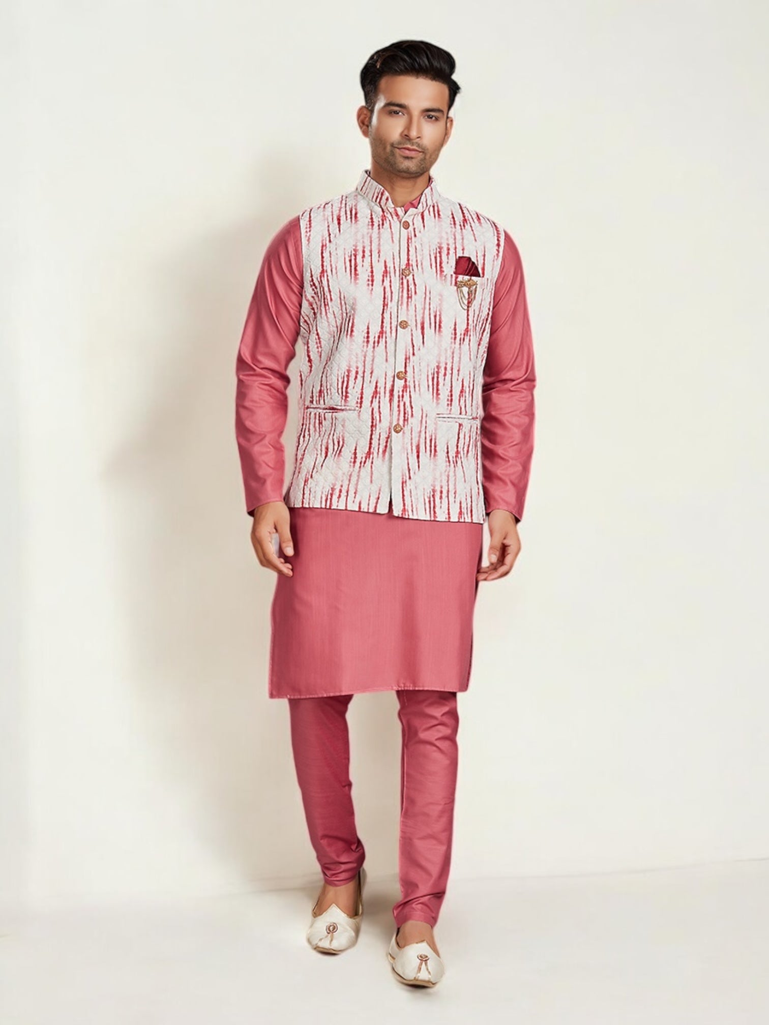 Pink traditional men's kurta pajama with matching jacket, ethnic wear by Saree Ghor Charlotte, featuring intricate embroidery and classic style.