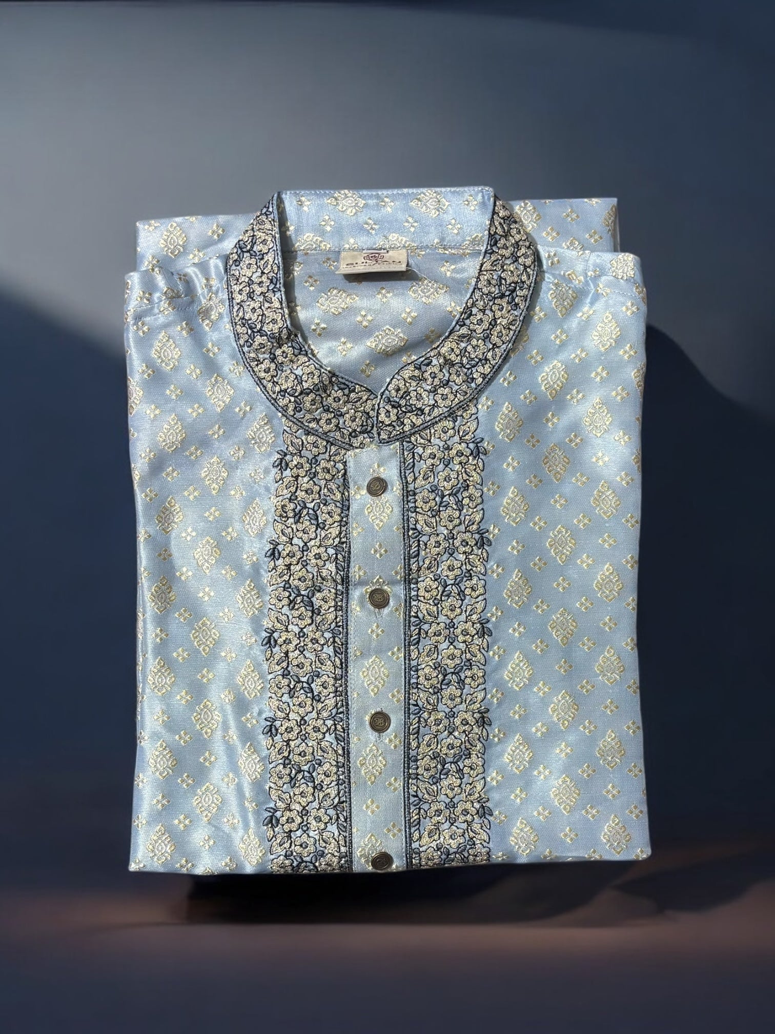 Traditional men's Kurta by Saree Ghor Charlotte, showcasing a classic ethnic wear design in vibrant fabric and intricate detailing.