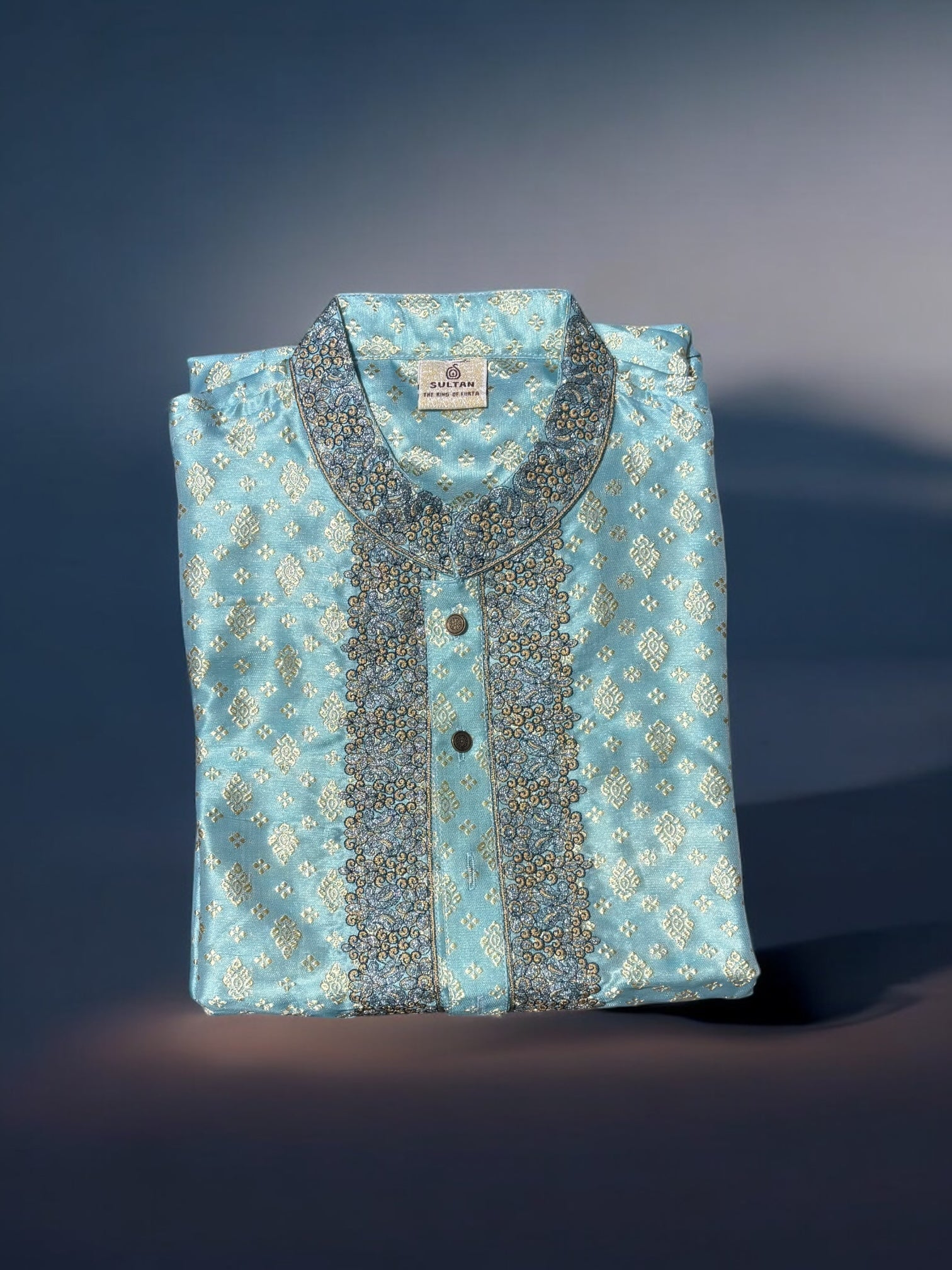 Traditional men's kurta in vibrant fabric from Saree Ghor Charlotte, showcasing classic ethnic wear for men.