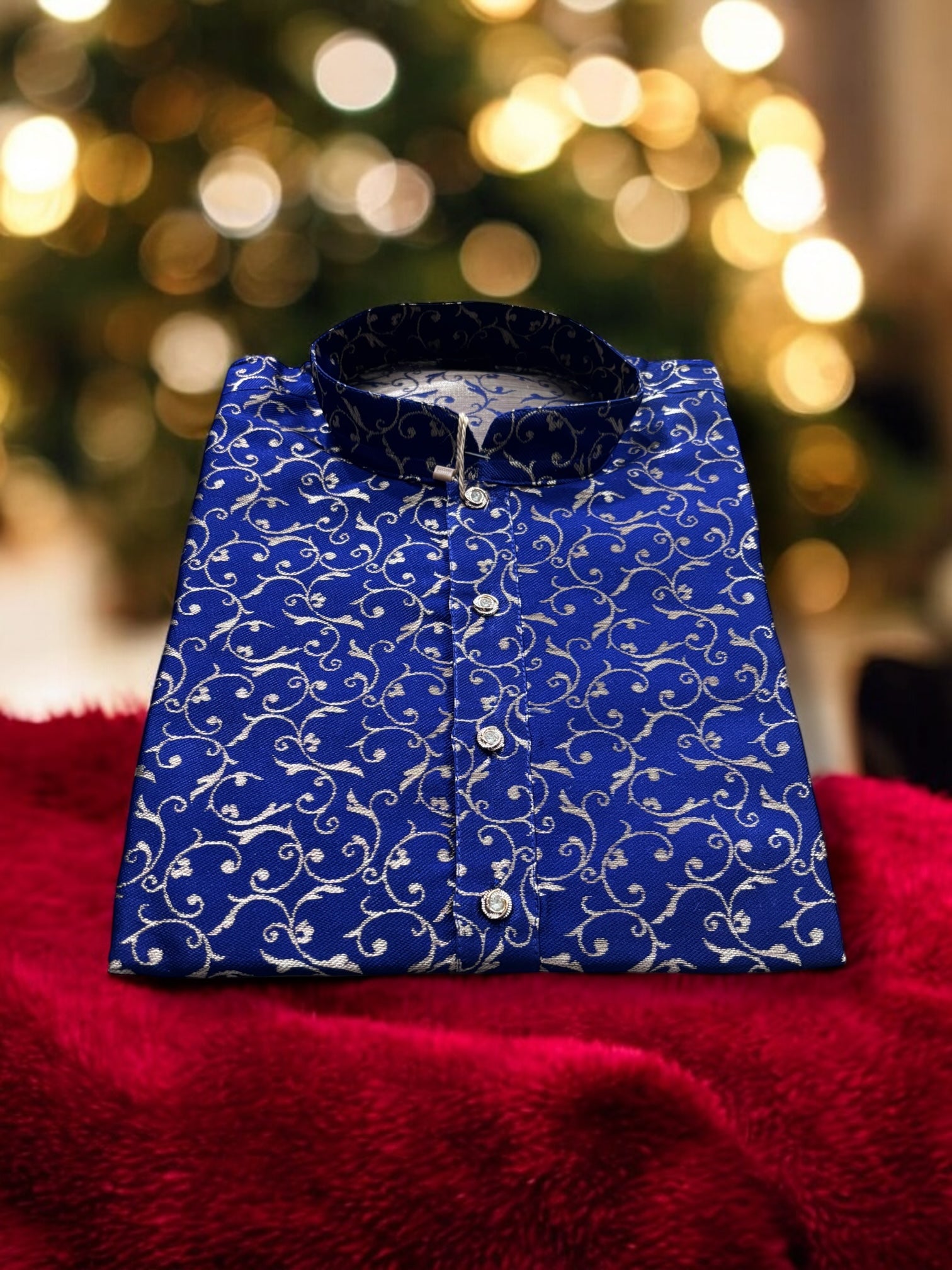 Traditional navy blue silk men's kurta from Saree Ghor Charlotte, showcasing ethnic wear with intricate detailing.