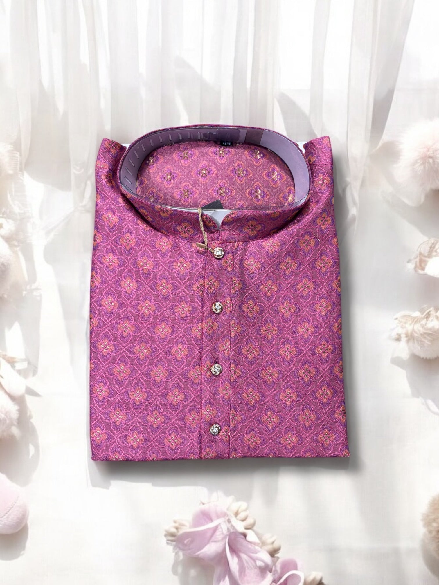 Traditional men's onion pink silk kurta by Saree Ghor Charlotte, showcasing ethnic wear with intricate detailing and vibrant color.