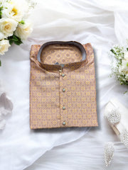 Traditional peach silk men's kurta by Saree Ghor Charlotte, showcasing intricate ethnic design and classic fit.