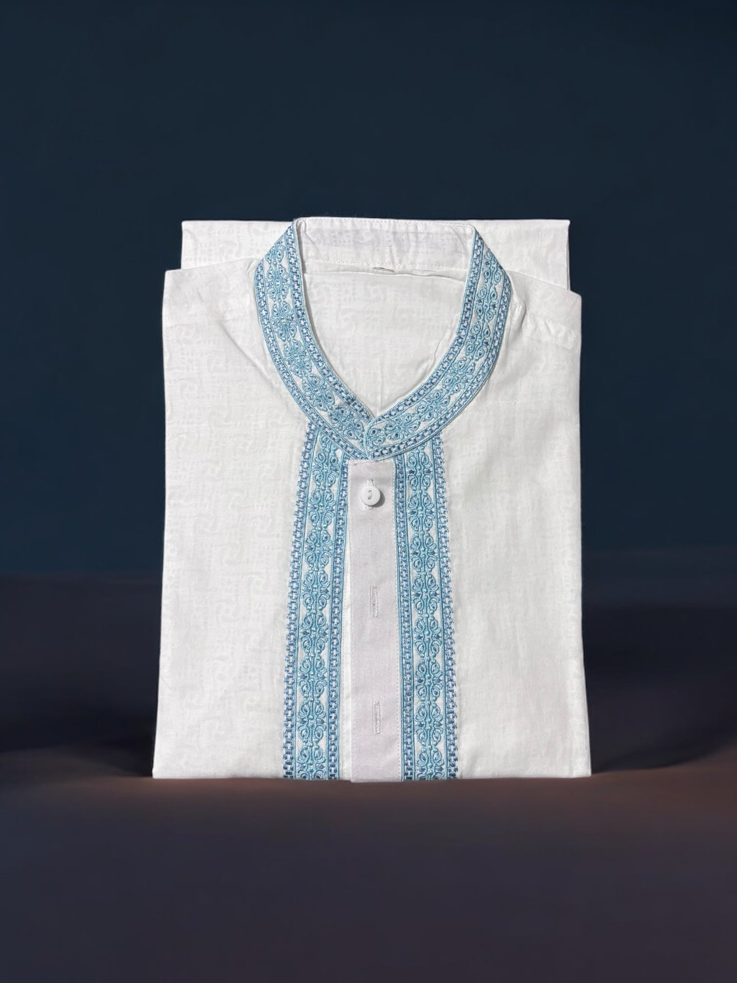 White cotton men's kurta from Saree Ghor Charlotte featuring traditional ethnic wear design with a classic fit and collar.