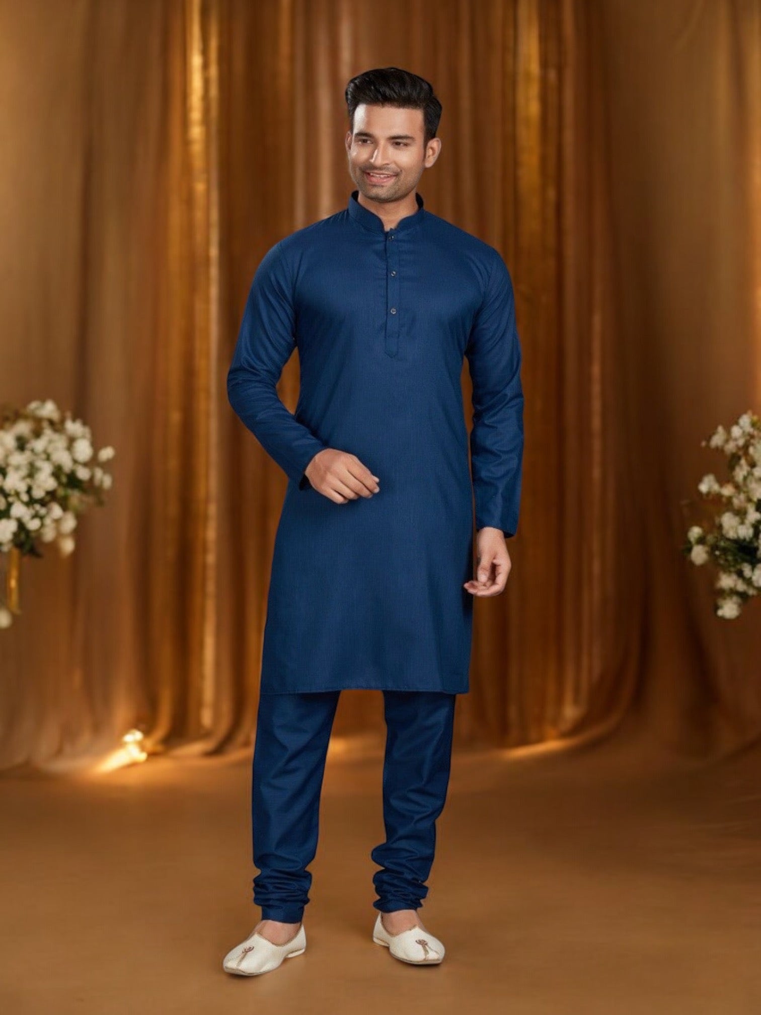 Blue men's Kurta pajama set by Saree Ghor Charlotte, traditional ethnic wear with intricate details and comfortable fit.