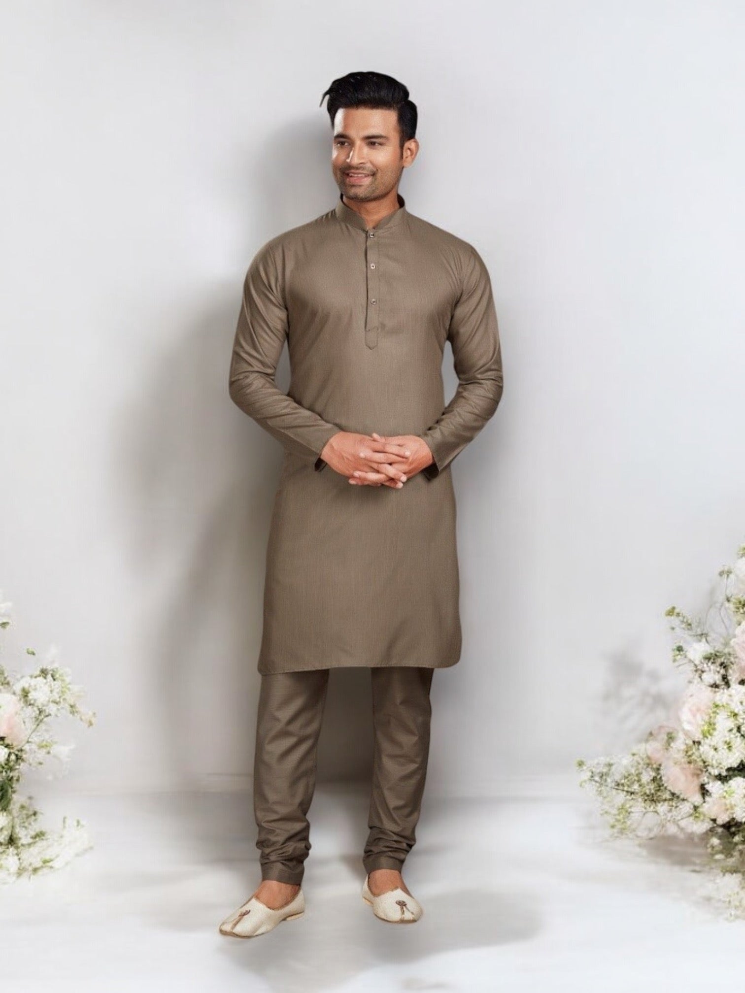 Light brown men's kurta and pajama set by Saree Ghor Charlotte, traditional ethnic wear for men, shown on a model.