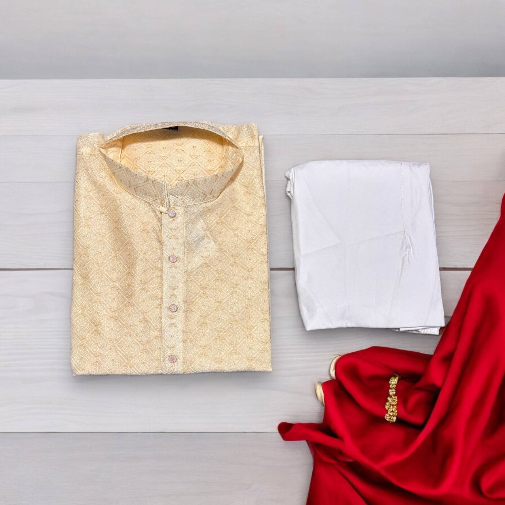 Men's cream traditional silk kurta and pajama set by Saree Ghor Charlotte, featuring elegant embroidery and classic design.