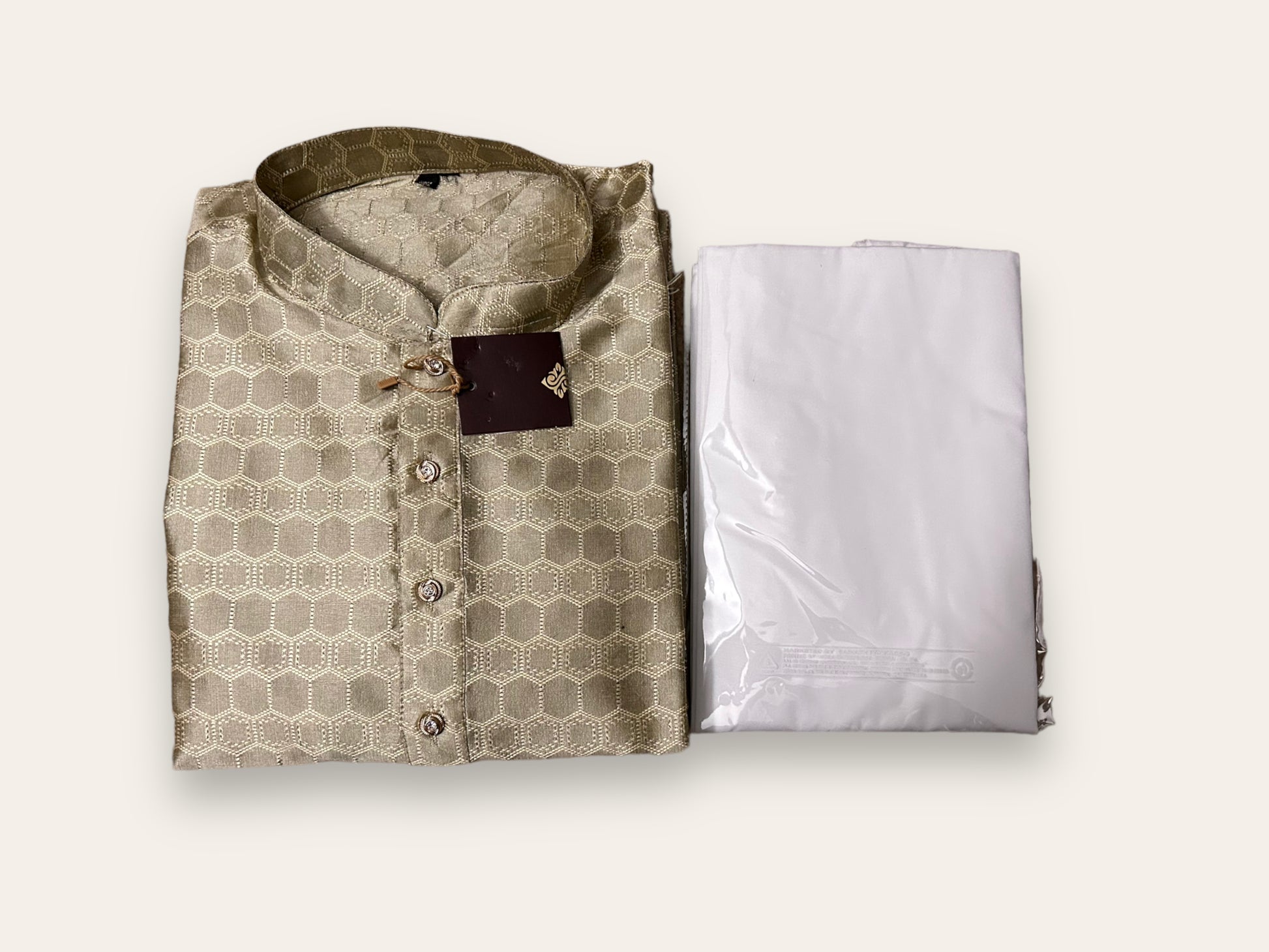 Mens gray traditional silk kurta and pajama set from Saree Ghor Charlotte, showcasing ethnic wear with intricate fabric details.