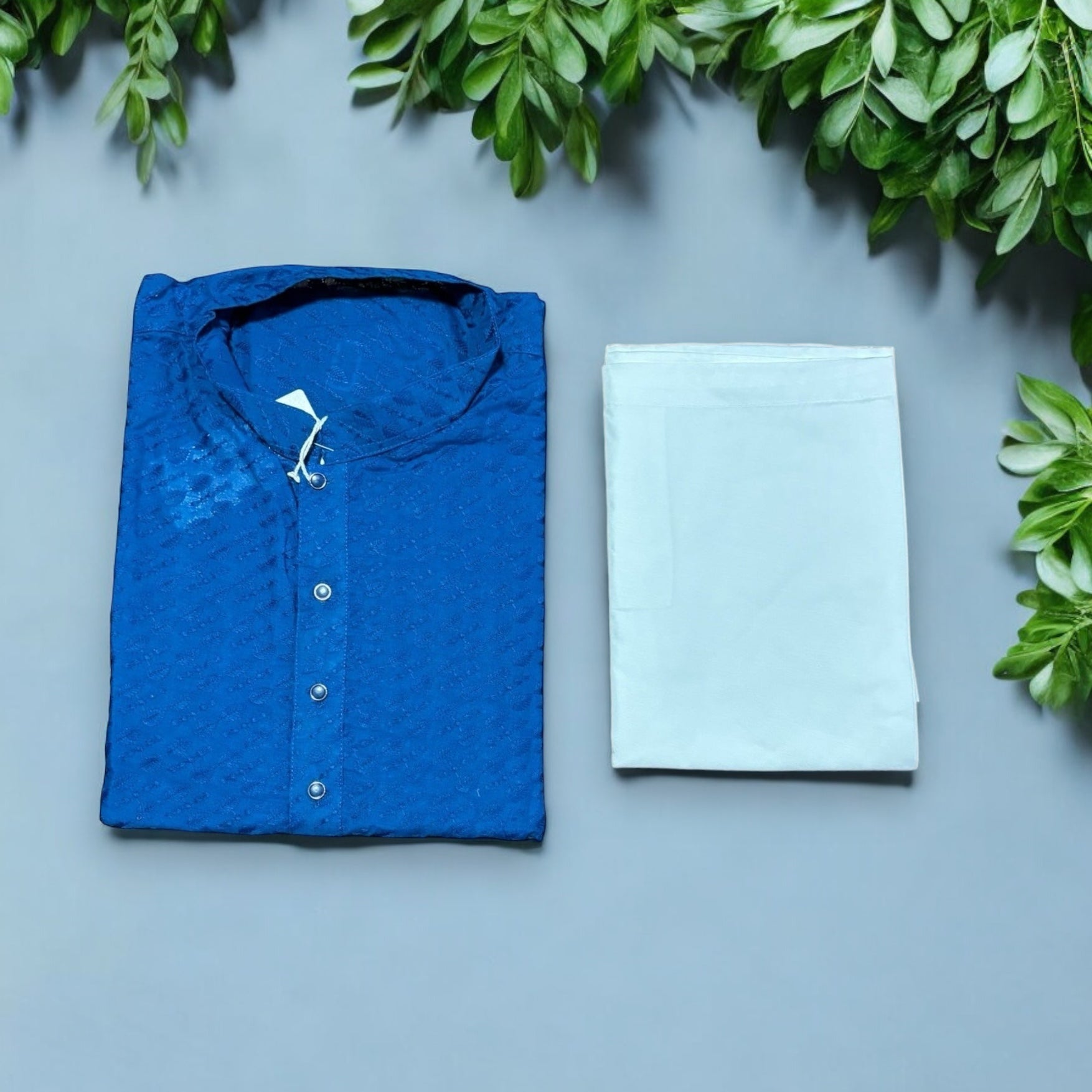 Men's traditional blue sequence kurta and pajama set by Saree Ghor Charlotte, featuring intricate design and comfortable fit.