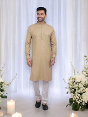 Mustard color traditional men's kurta and pajama from Saree Ghor Charlotte, festive ethnic wear, casual and cultural attire.
