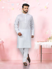 White Outluk 57 cotton kurta with matching pajama set for men, traditional ethnic wear by Saree Ghor Charlotte.