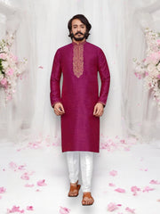 Dark pink designer men's kurta with traditional art silk fabric and matching pajama, ideal for party or cultural wear.