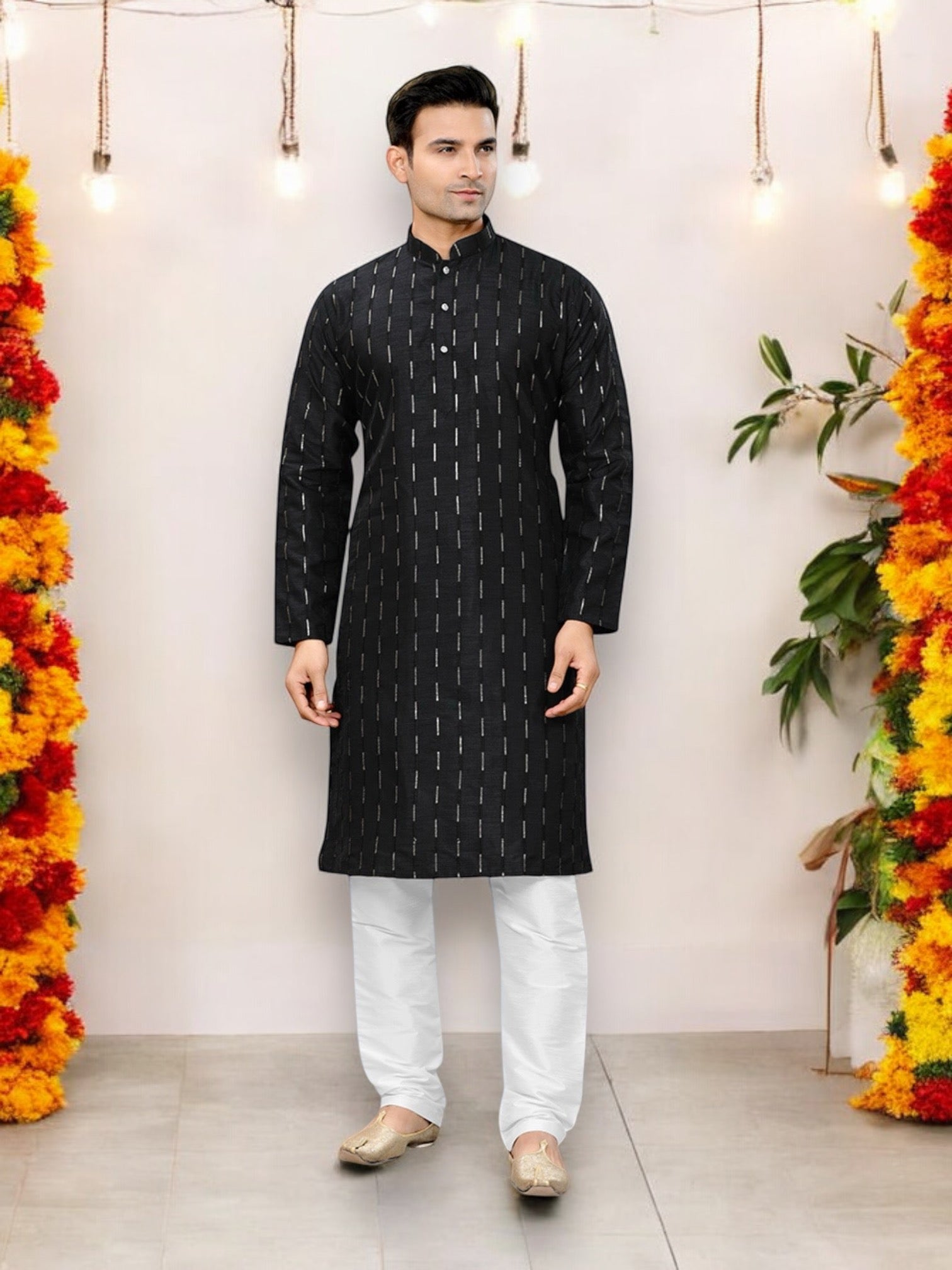 Men's traditional black kurta and pajama set by Saree Ghor Charlotte, featuring classic design and comfortable fabric.