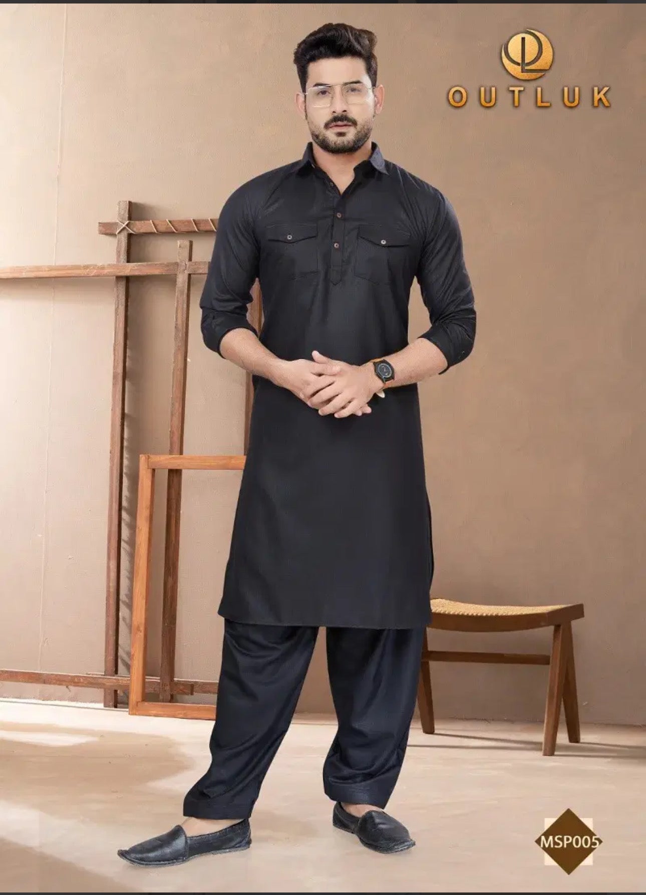 Traditional black Pathani cotton Kurta and pajama outfit for men by Saree Ghor Charlotte, featuring classic design and comfortable fit.