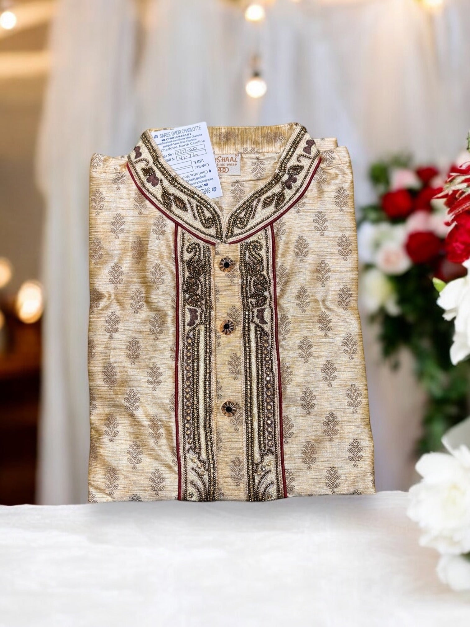 Traditional men's cotton party wear kurta by Saree Ghor Charlotte with intricate embroidery and classic design.