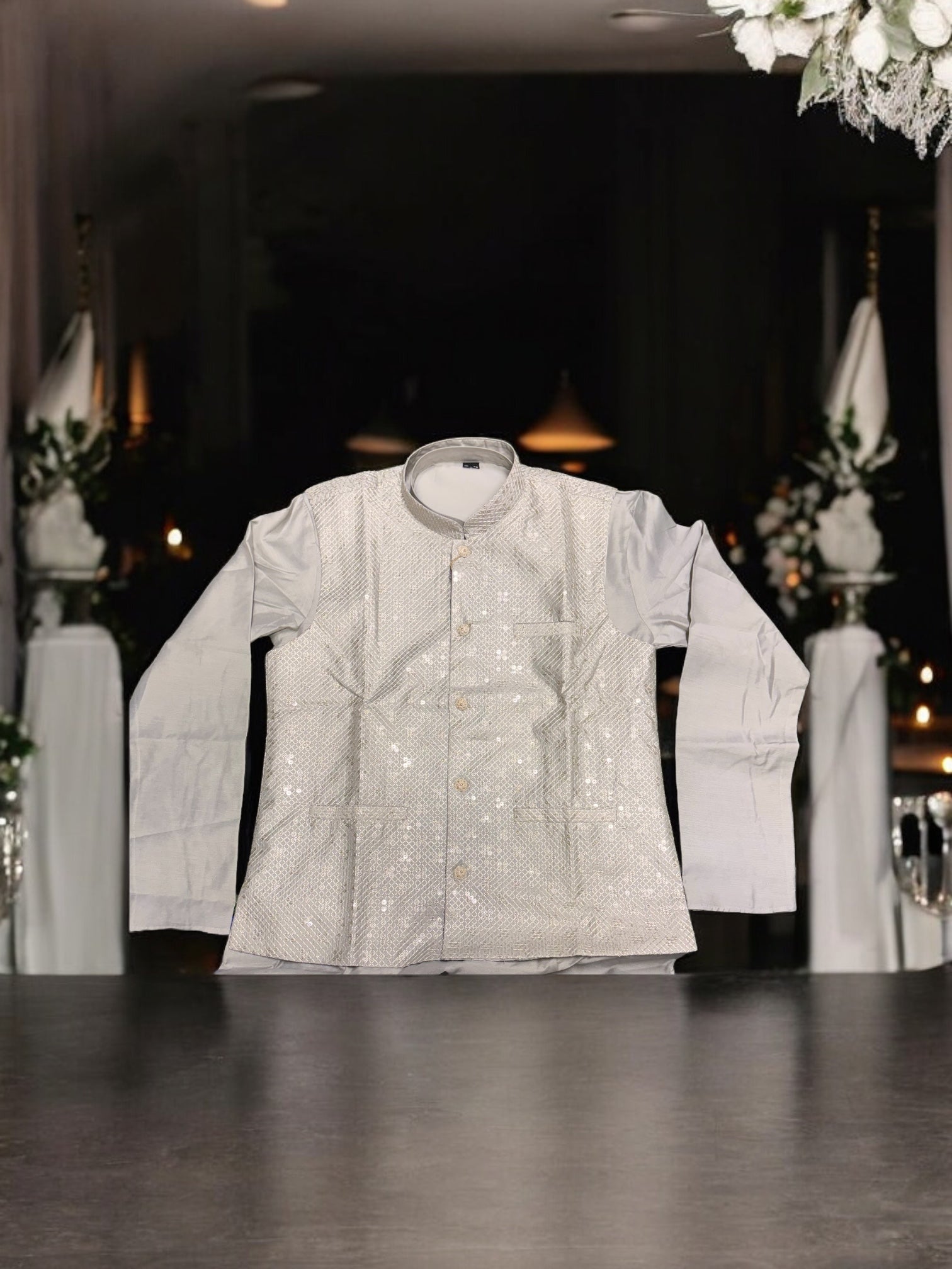 Traditional gray silk men's kurta set with matching pant and coat, detailed fabric texture, from Saree Ghor Charlotte.