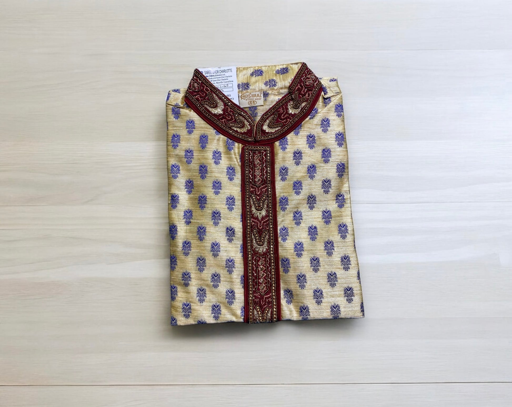 Traditional men's cotton party wear kurta by Saree Ghor Charlotte, showcasing a classic design with detailed embroidery.