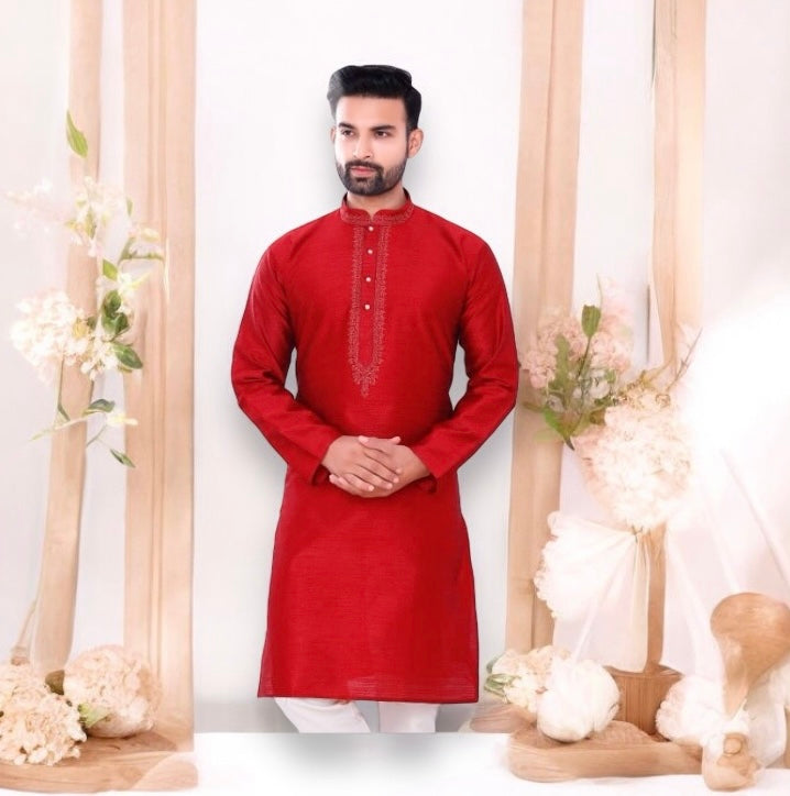 Traditional men's silk kurta with intricate embroidery and matching pajama, worn for cultural occasions, by Saree Ghor Charlotte.