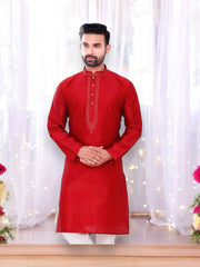 Traditional men's silk kurta and pajama set by Saree Ghor Charlotte, showcasing elegant ethnic men's wear in rich silk fabric.