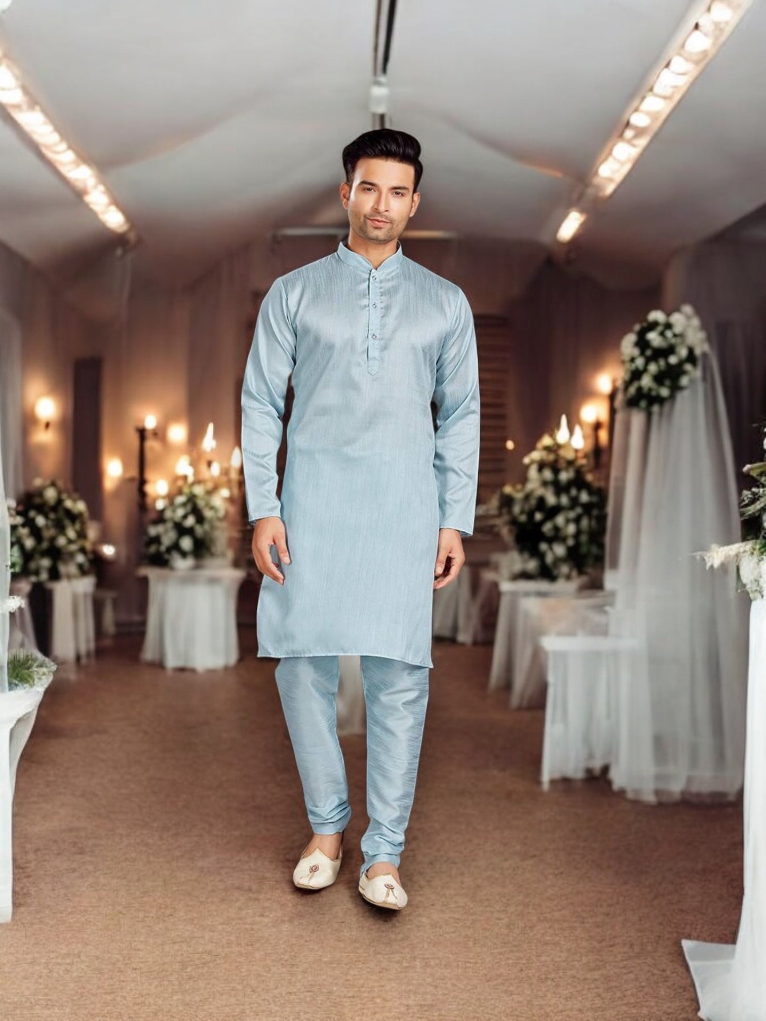 Traditional sky blue silk men's kurta pajama set by Saree Ghor Charlotte, featuring intricate embroidery and classic design.