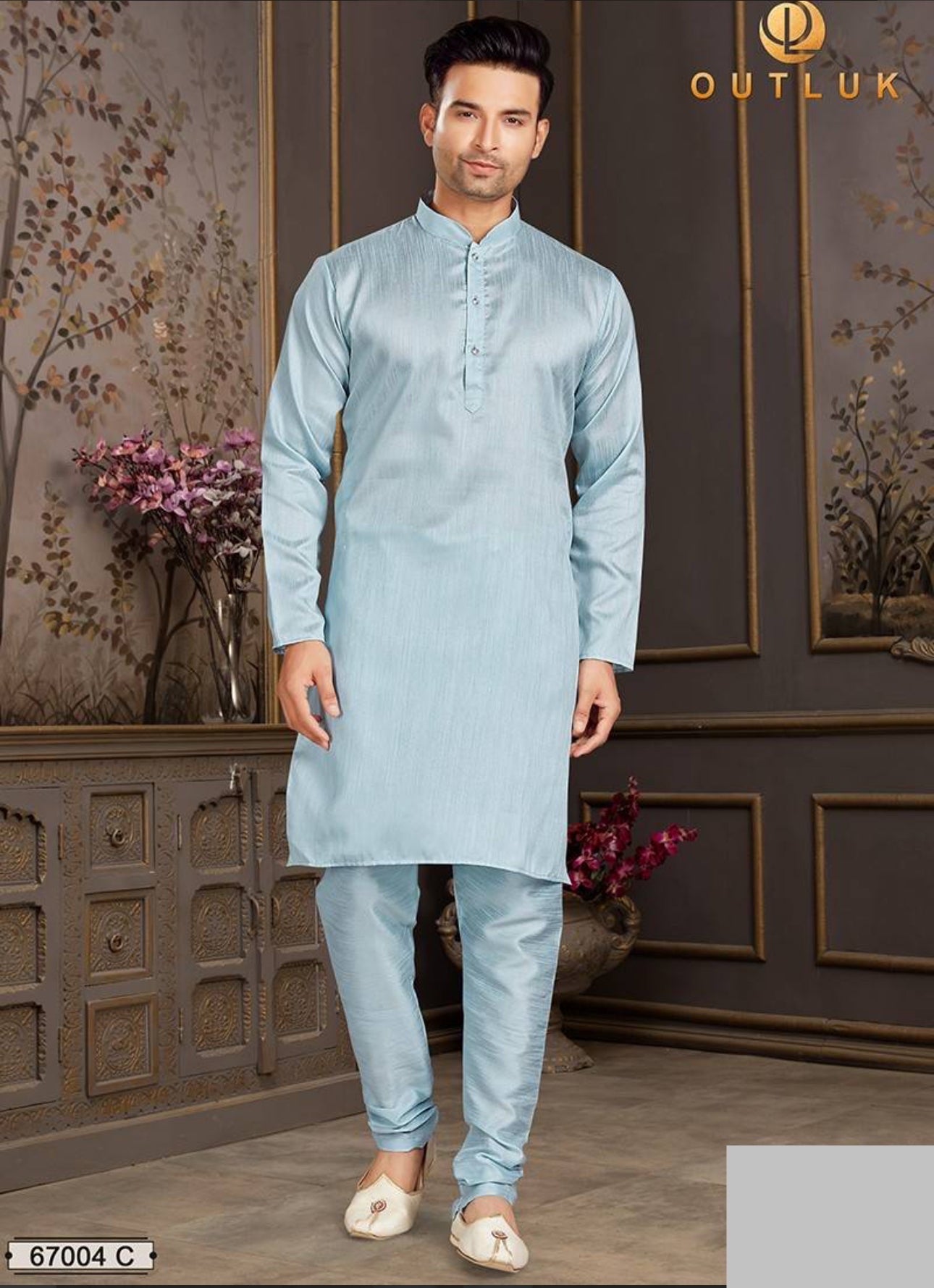 Traditional sky blue silk men's kurta pajama set by Saree Ghor Charlotte, featuring intricate embroidery and classic design.