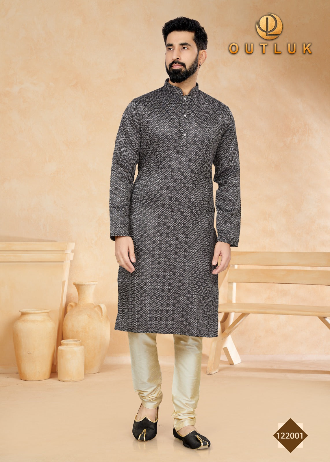 Traditional black jacquard men's kurta with matching pajama set by Saree Ghor Charlotte, showcasing intricate ethnic design.