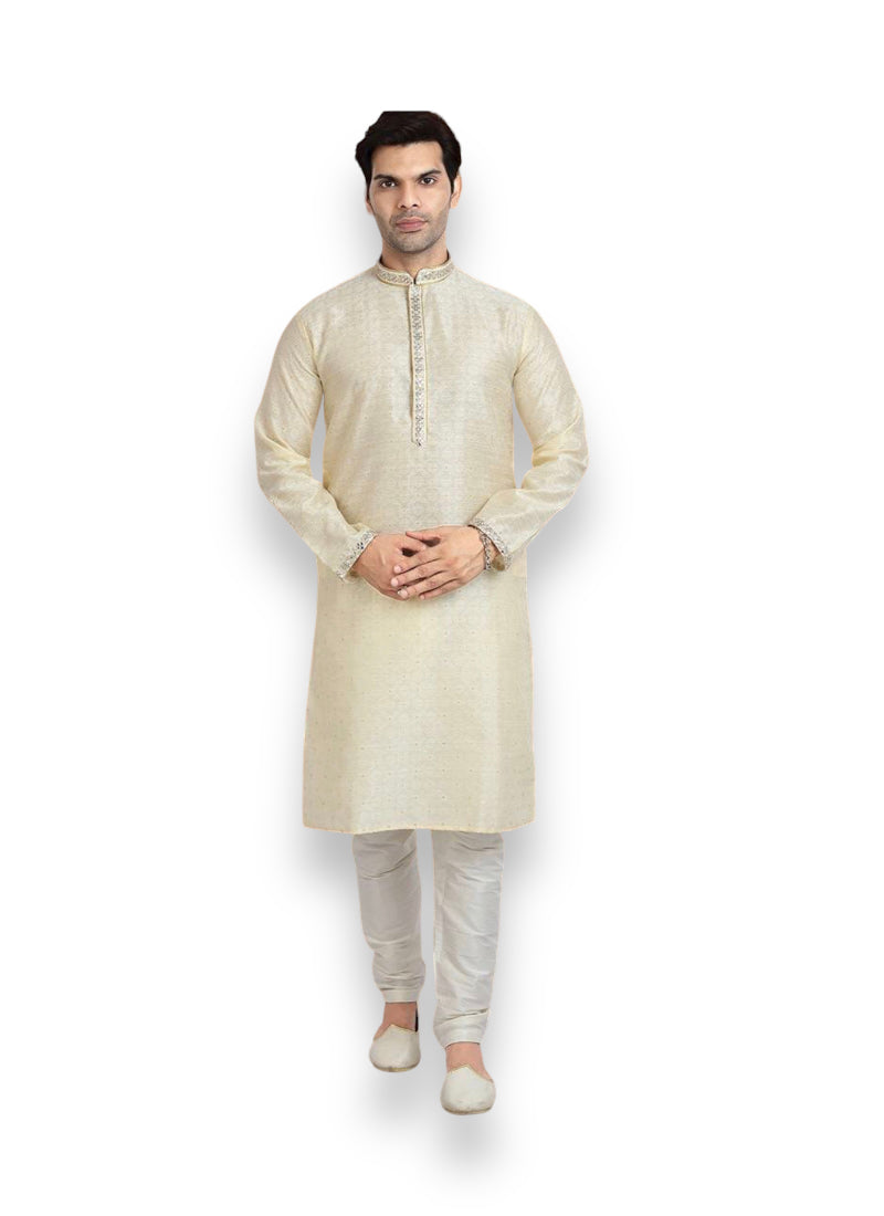 Cream-colored traditional jacquard silk men's kurta pajama with intricate patterns, ethnic wear by Saree Ghor Charlotte.