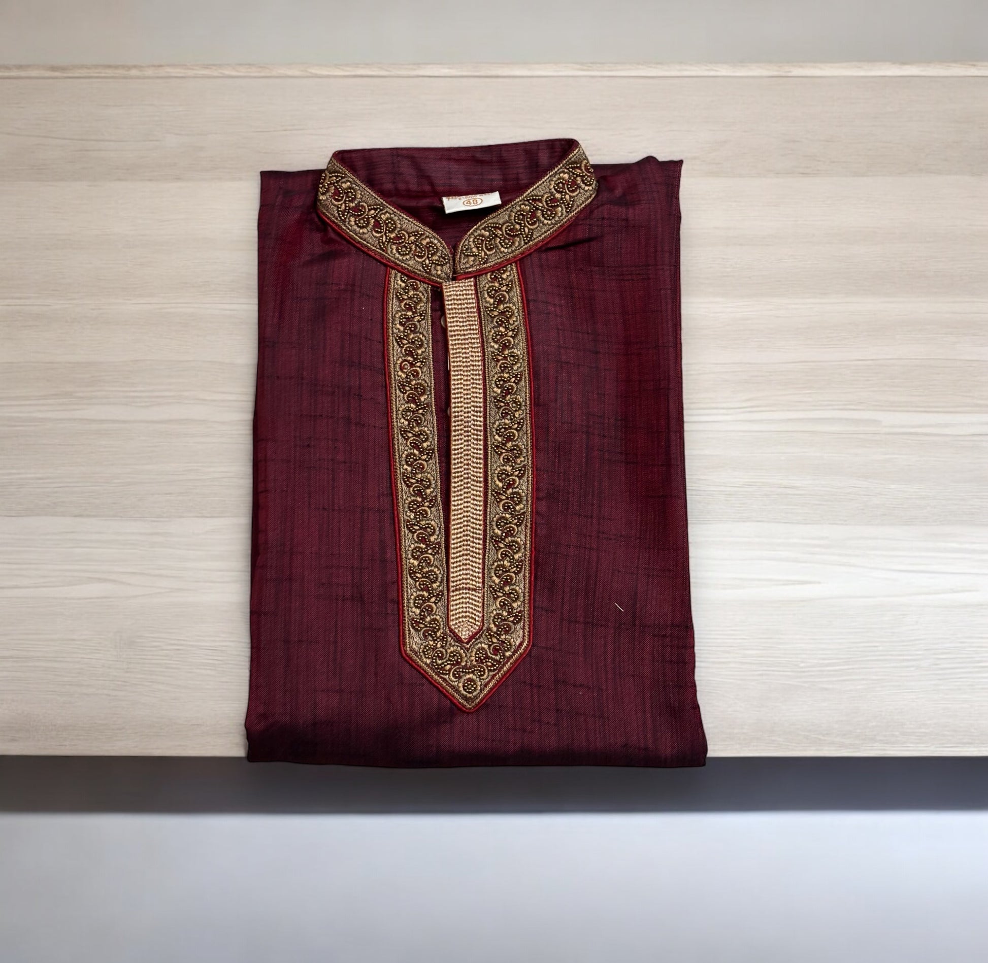Men's cotton party wear kurta by Saree Ghor Charlotte, featuring traditional ethnic design and comfortable fabric for festive occasions.