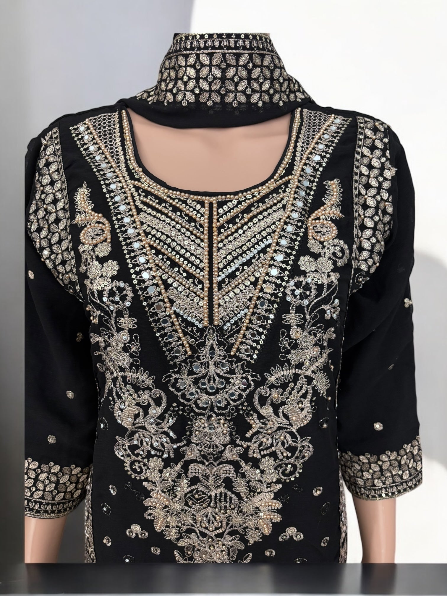 Black traditional designer Salwar Kameez suit by Saree Ghor Charlotte featuring intricate ethnic embroidery for women.