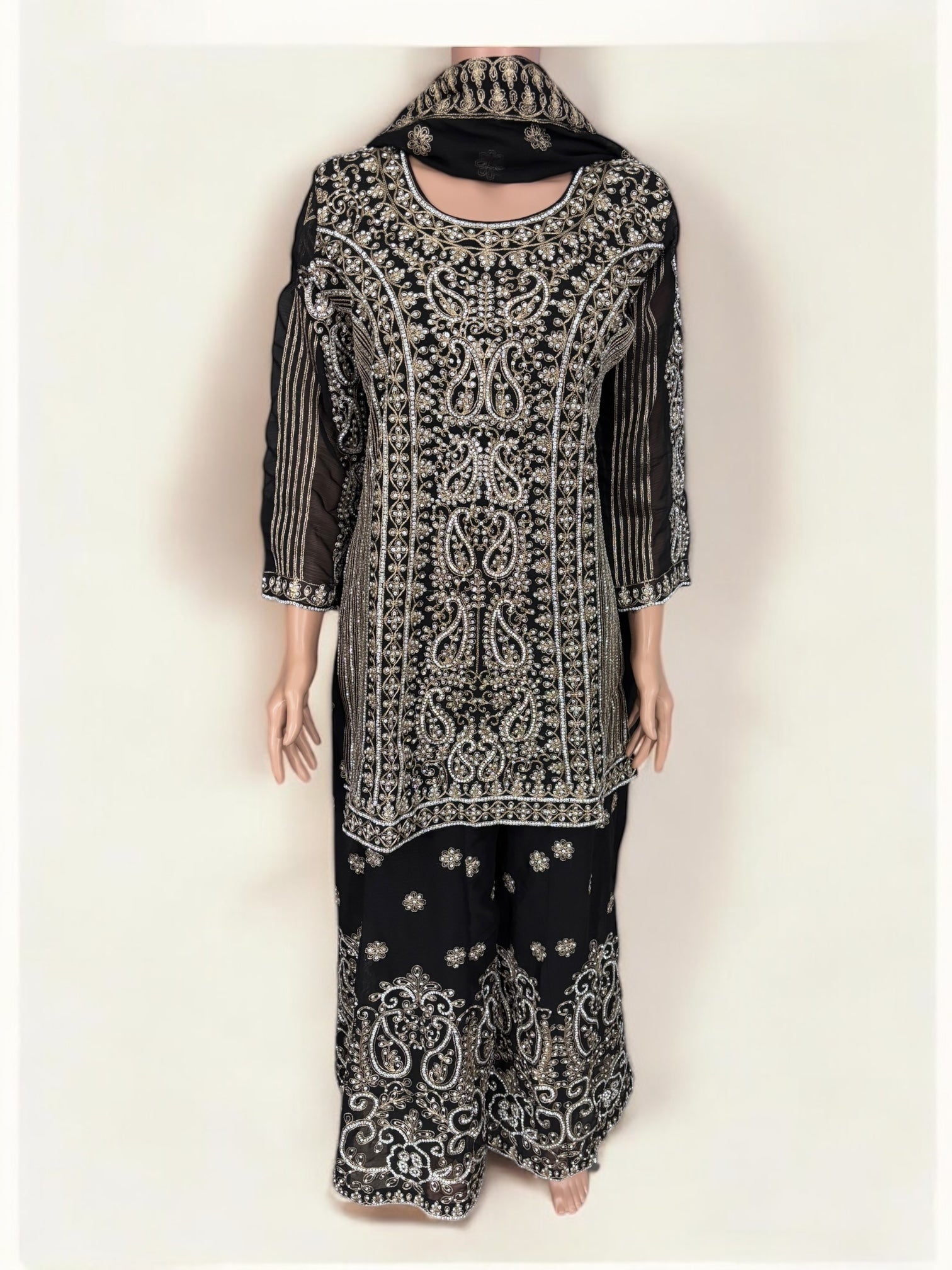 Black traditional designer Sharara Salwar Kameez suit for women, ethnic wear by Saree Ghor Charlotte featuring intricate embroidery.