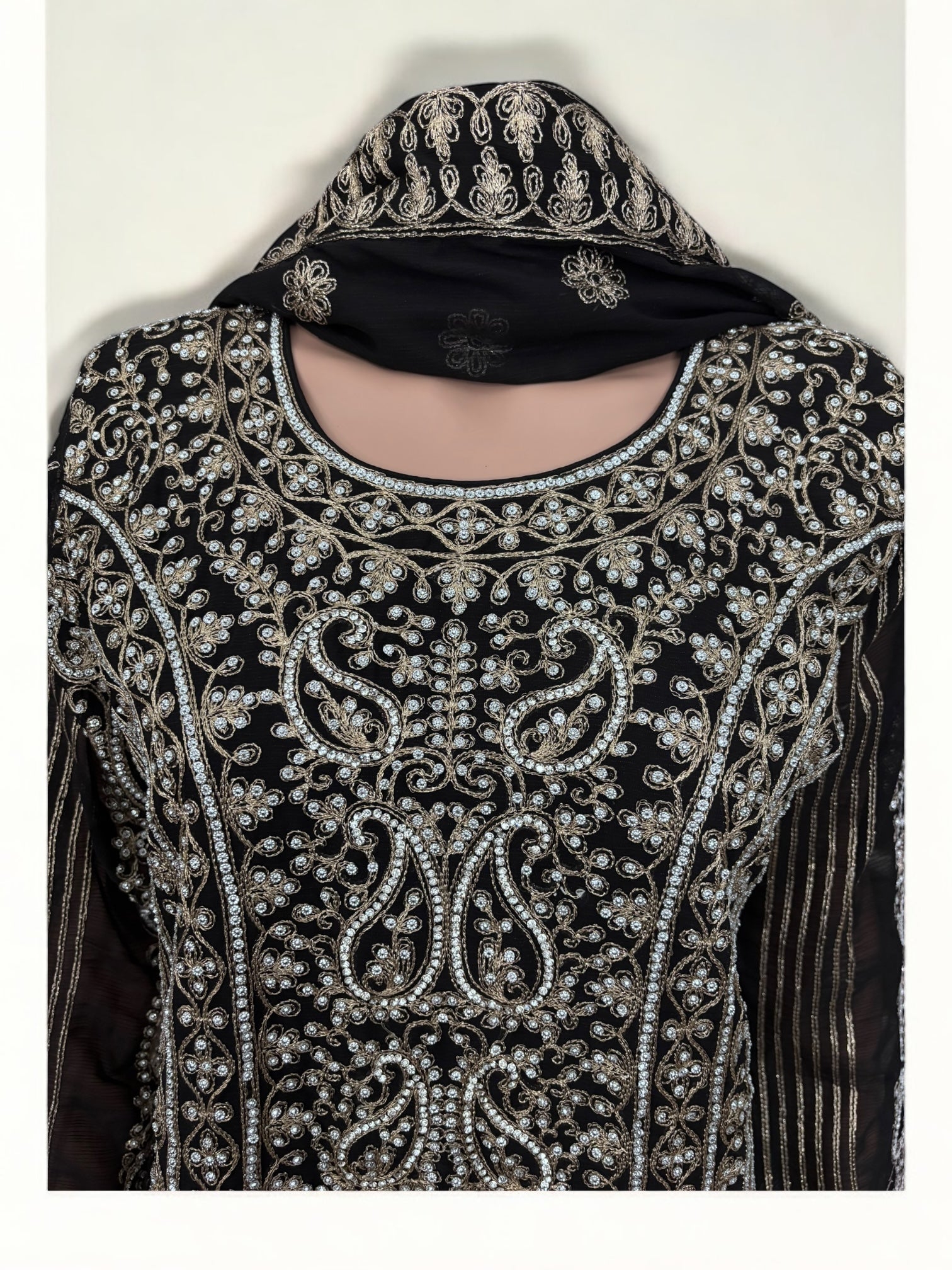 Black traditional designer Sharara Salwar Kameez suit by Saree Ghor Charlotte, showcasing intricate ethnic embroidery and elegant fabric.