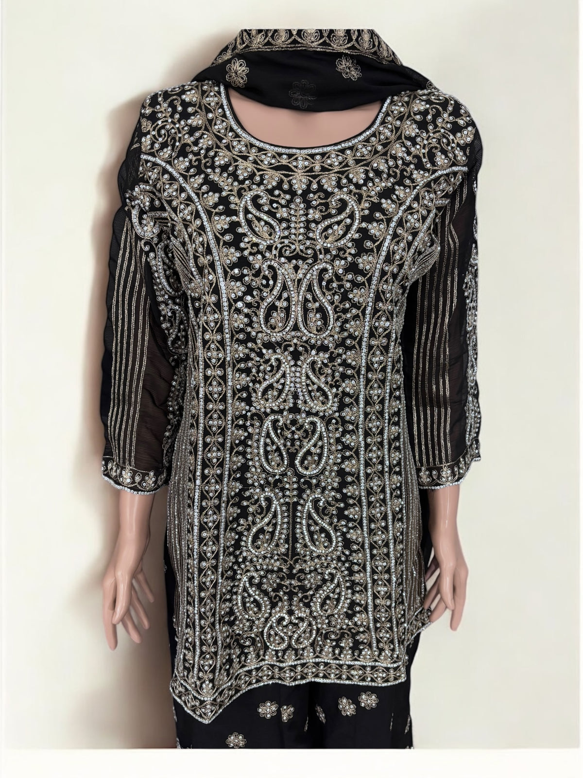 Black traditional designer Sharara Salwar Kameez suit for women by Saree Ghor Charlotte, showcasing intricate ethnic embroidery.