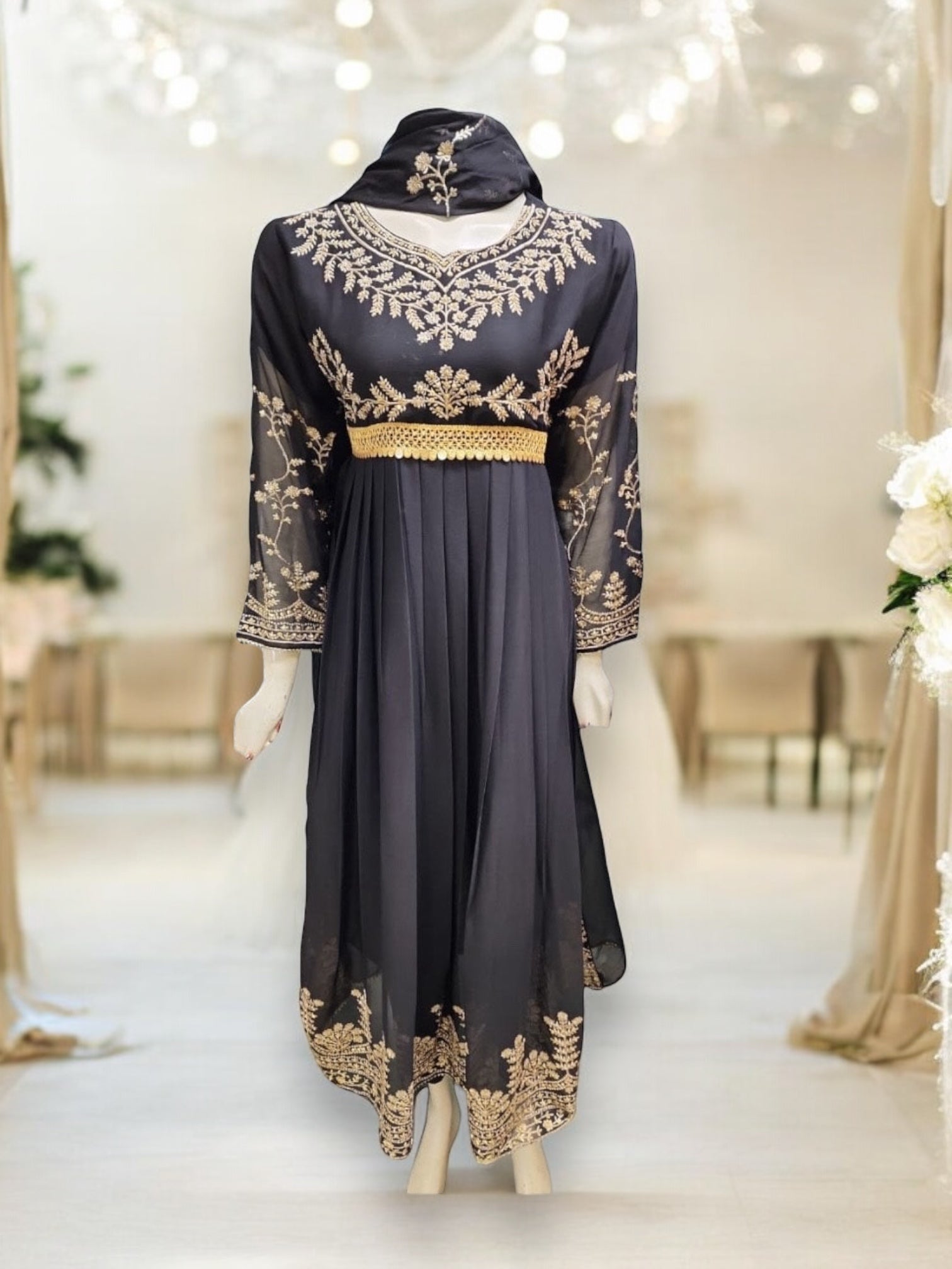 Elegant designer Salwar Kameez by Saree Ghor Charlotte featuring intricate embroidery, perfect for parties and cultural events.