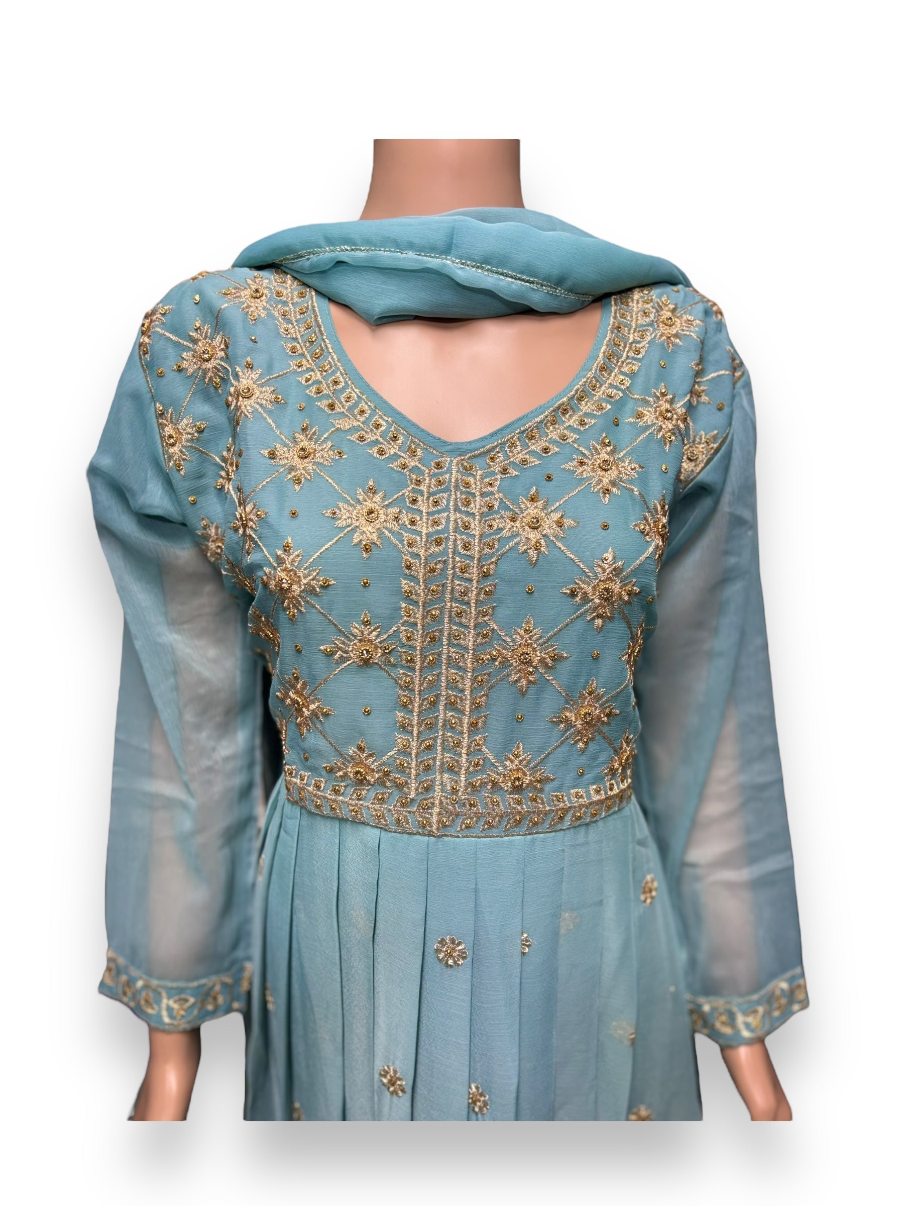 Elegant designer party wear salwar kameez by Saree Ghor Charlotte, featuring intricate ethnic embroidery for women.