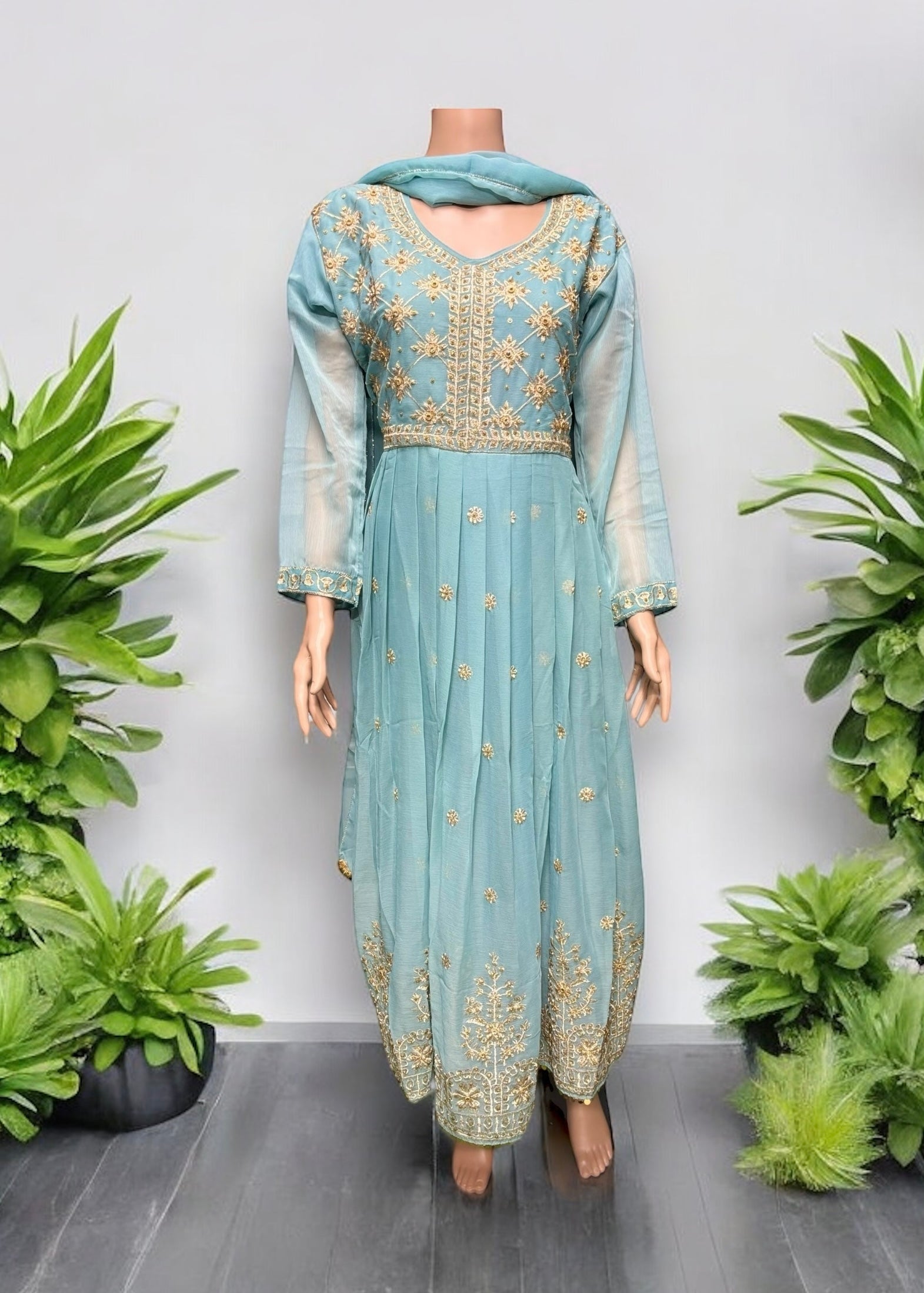 Elegant designer Salwar Kameez by Saree Ghor Charlotte, perfect for parties and cultural events, featuring intricate ethnic details.