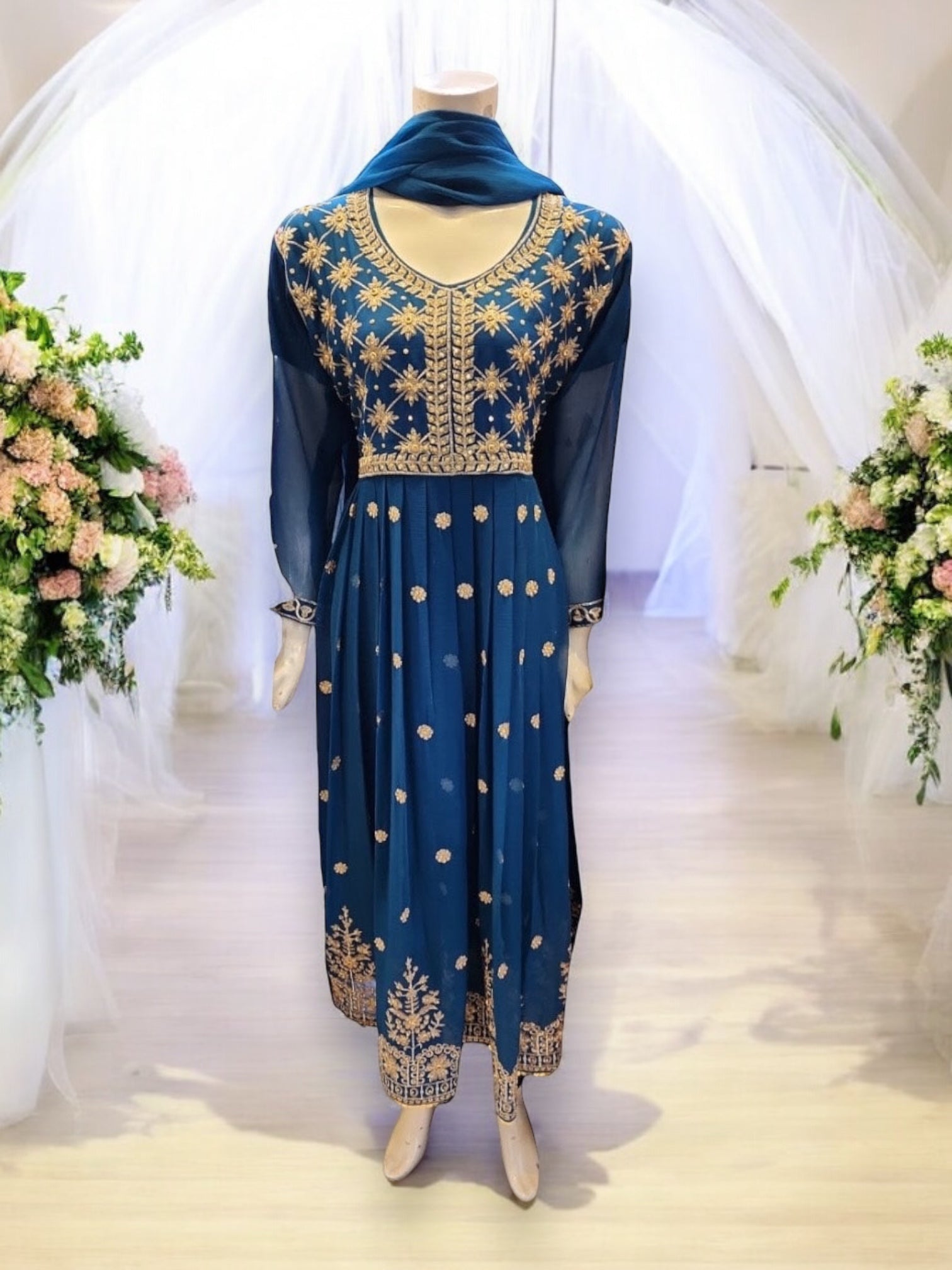 Designer party wear Salwar Kameez set by Saree Ghor Charlotte, elegant ethnic wear for women with intricate details and vibrant fabric.