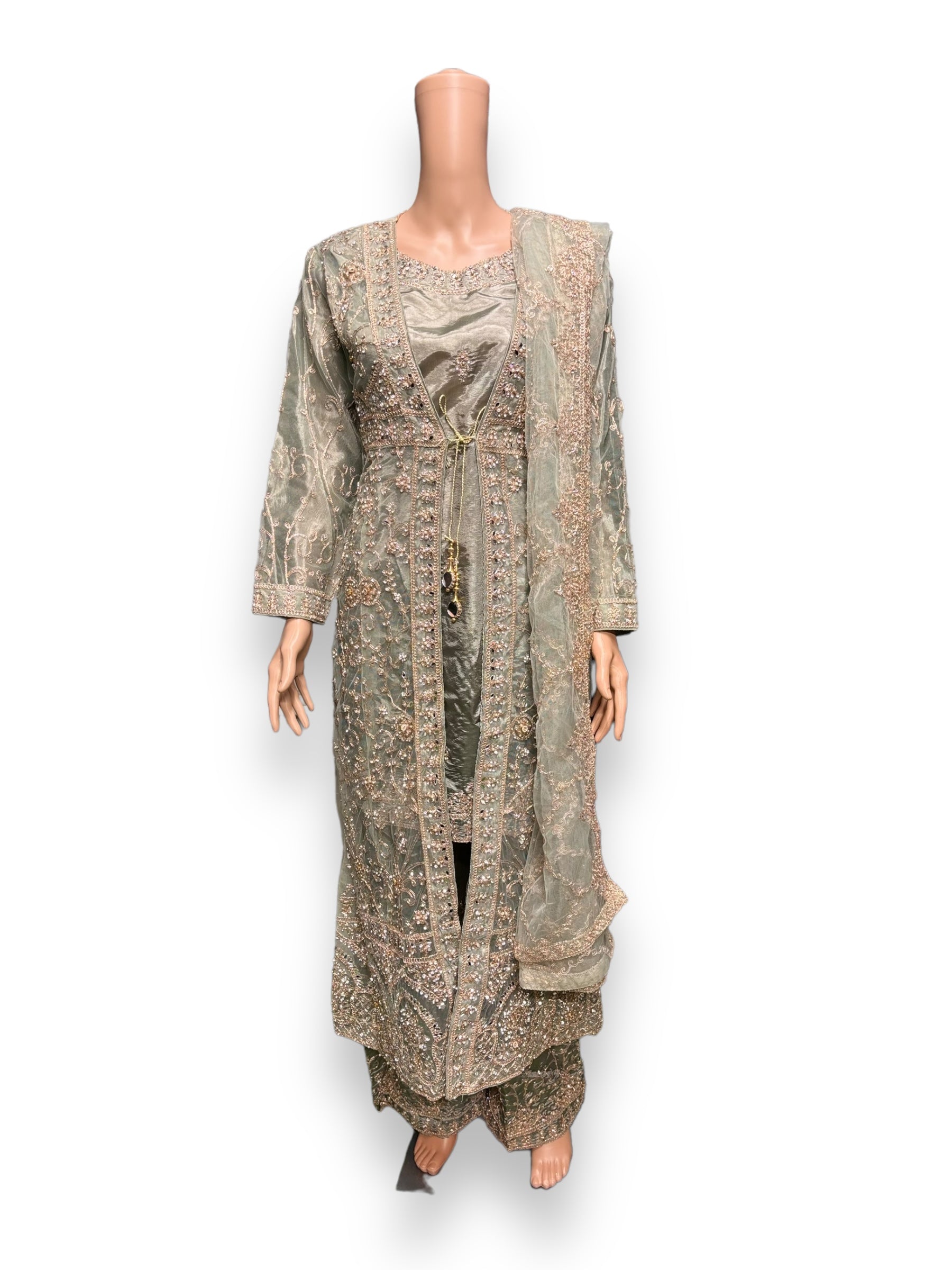 Designer party wear Salwar Kameez set by Saree Ghor Charlotte, stylish ethnic wear for women with intricate details.