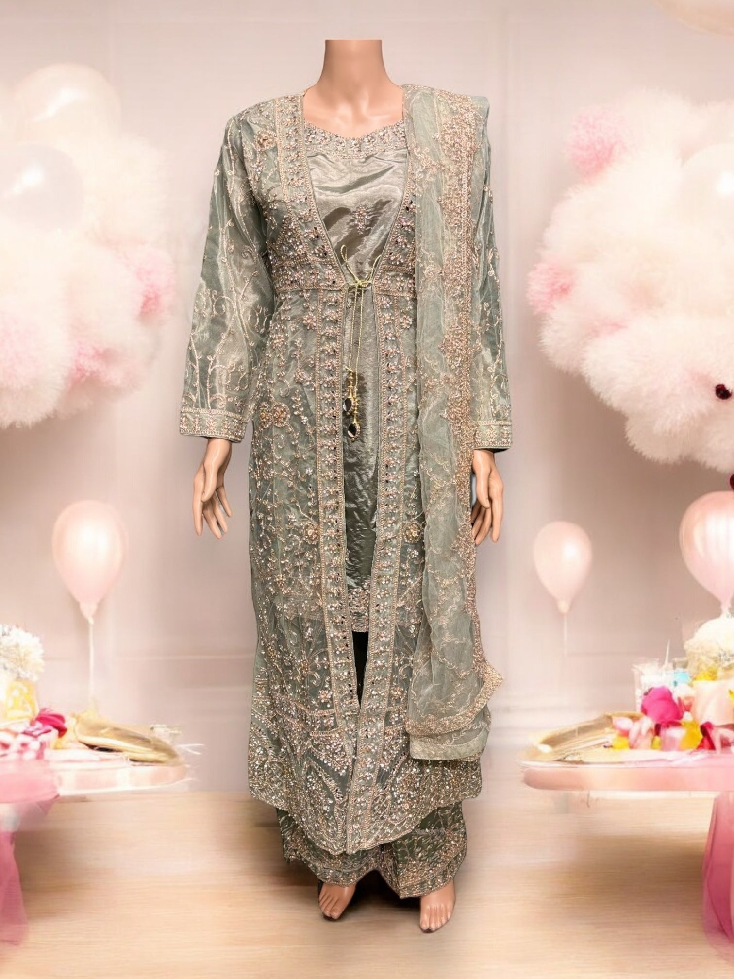 Designer Salwar Kameez set by Saree Ghor Charlotte, elegant party wear ethnic outfit for women with intricate details.