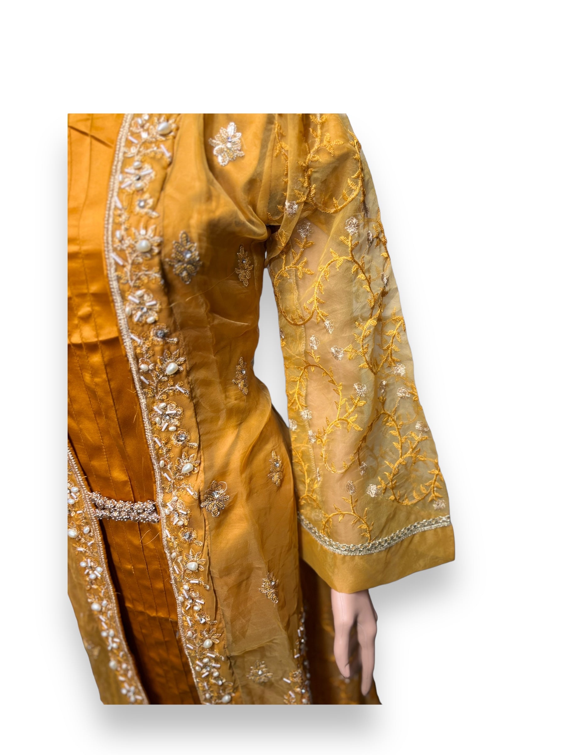 Designer party wear Salwar Kameez set by Saree Ghor Charlotte, with intricate embroidery and vibrant ethnic style for women.