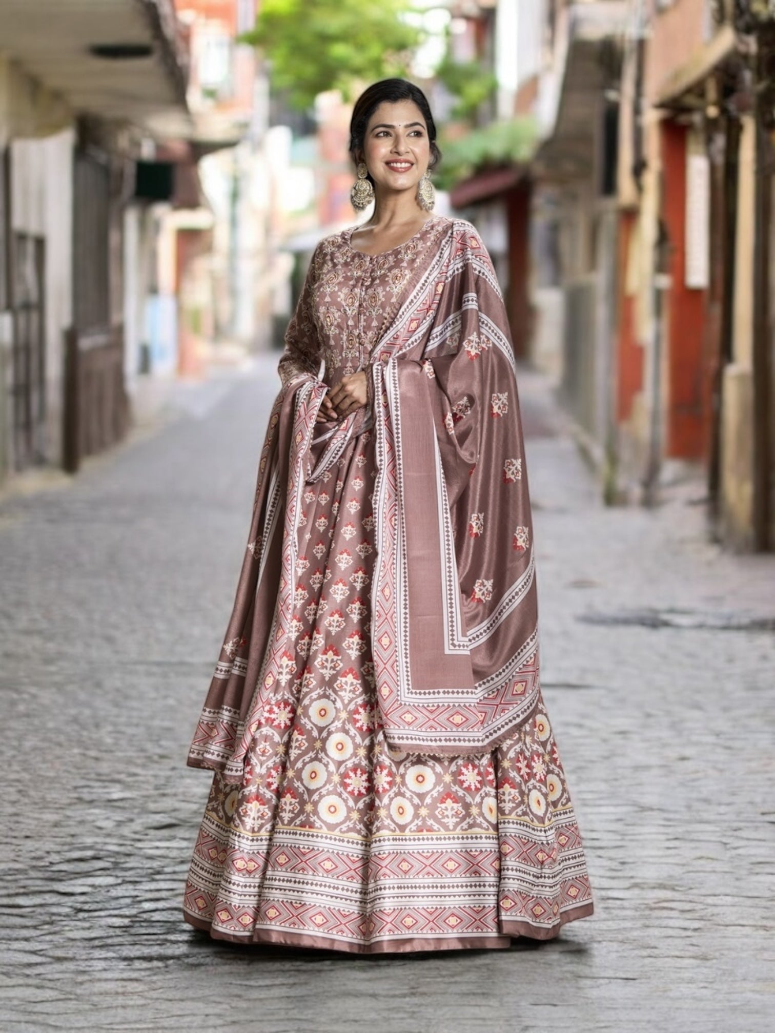 Dola Silk printed traditional designer gown by Saree Ghor Charlotte, elegant ethnic wear for women, colorful and intricate design.