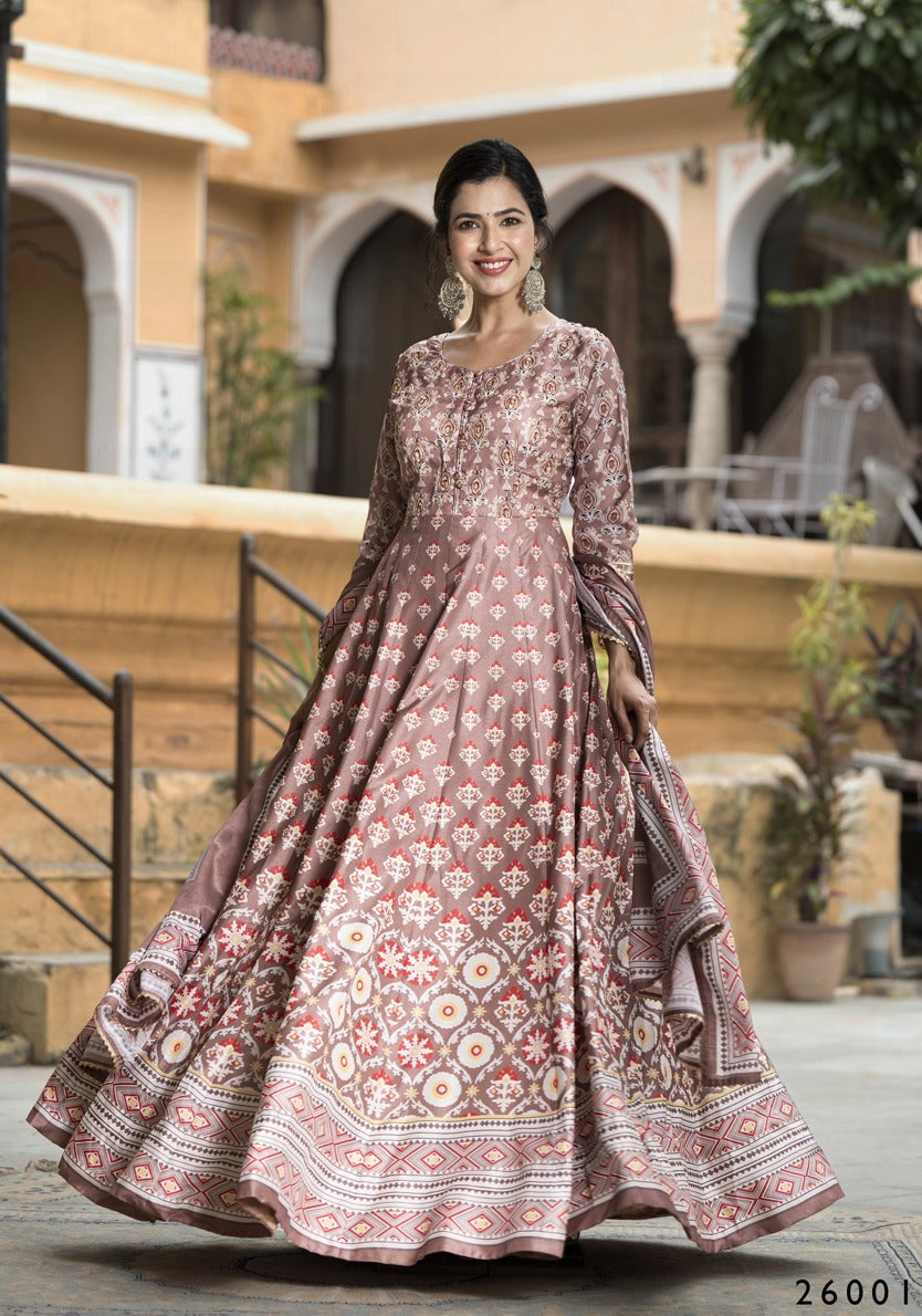 Dola Silk printed traditional designer salwar kameez for women, showcasing intricate ethnic embroidery and vibrant colors.