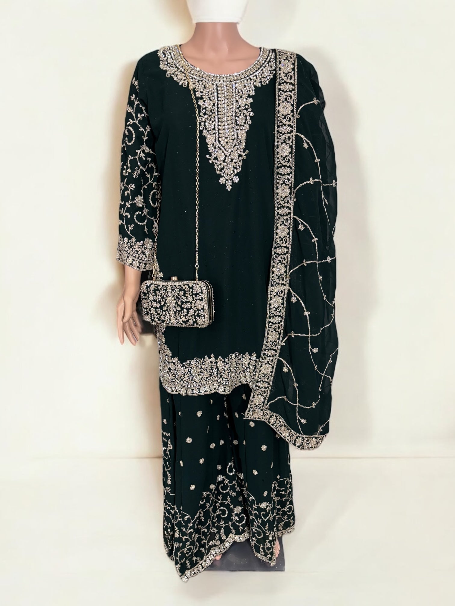 Green traditional designer Salwar Kameez suit with matching handbag, ethnic wear for women by Saree Ghor Charlotte.