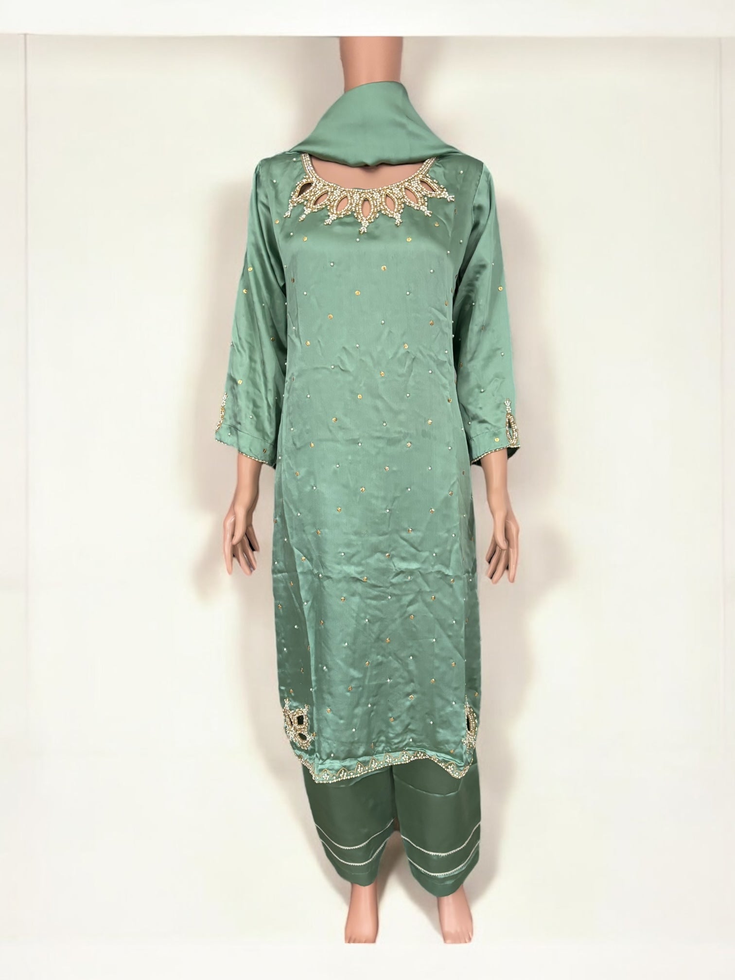 Mint color traditional designer Salwar Kameez suit for women by Saree Ghor Charlotte, showcasing intricate ethnic embroidery.