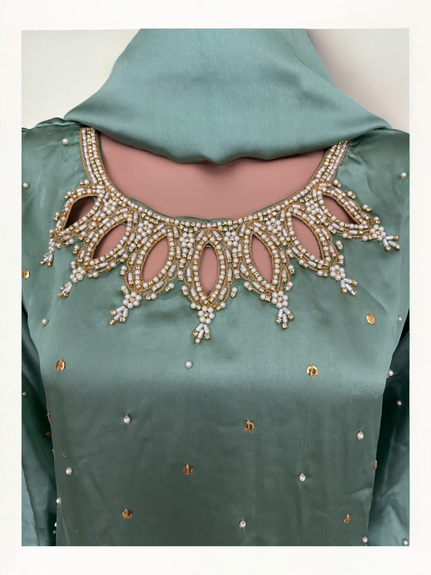 Mint color traditional designer Salwar Kameez suit for women by Saree Ghor Charlotte, showcasing intricate ethnic embroidery.