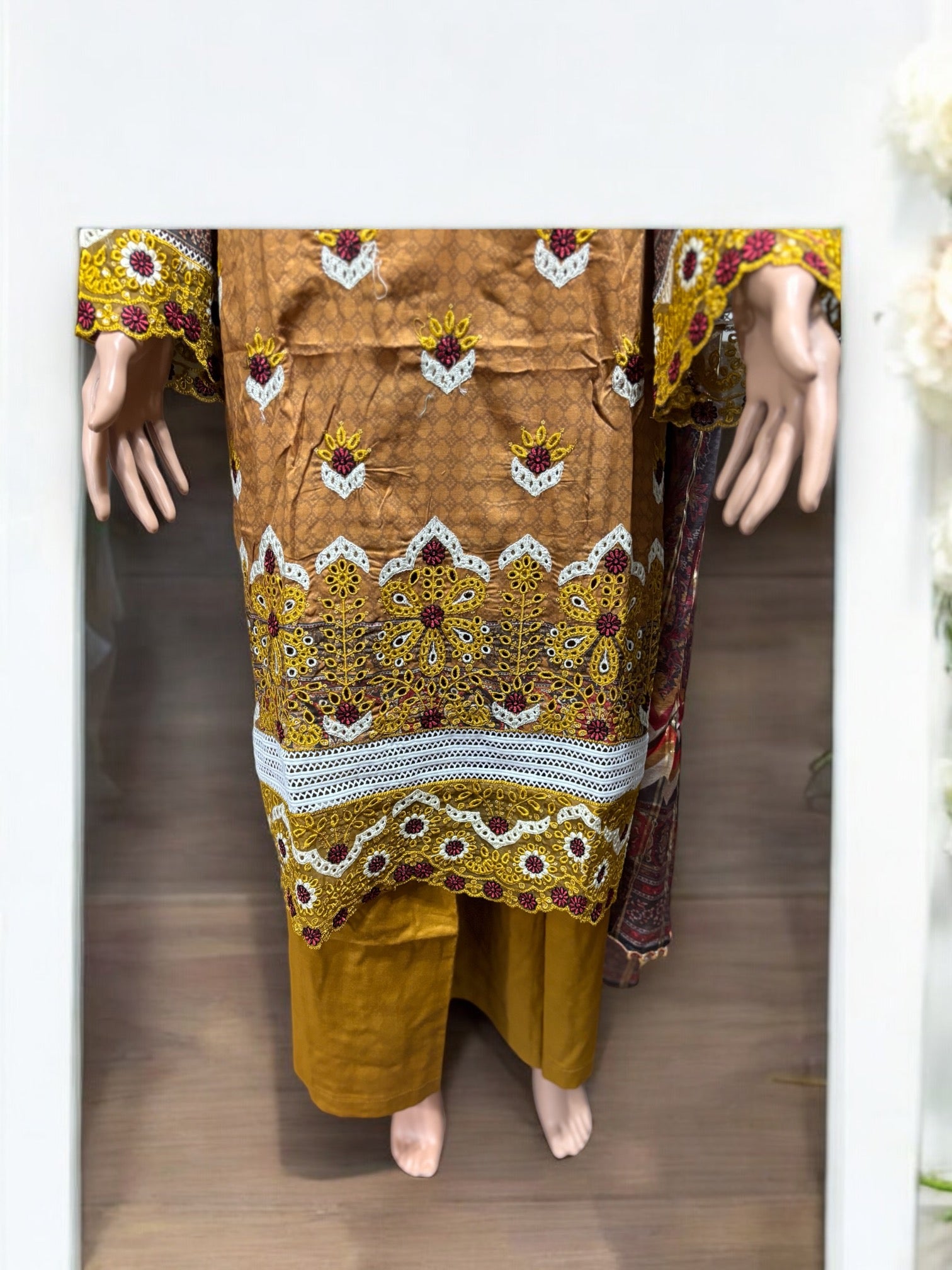 Pakistani traditional Salwar Kameez set by Saree Ghor Charlotte, featuring elegant ethnic wear for women with intricate designs.