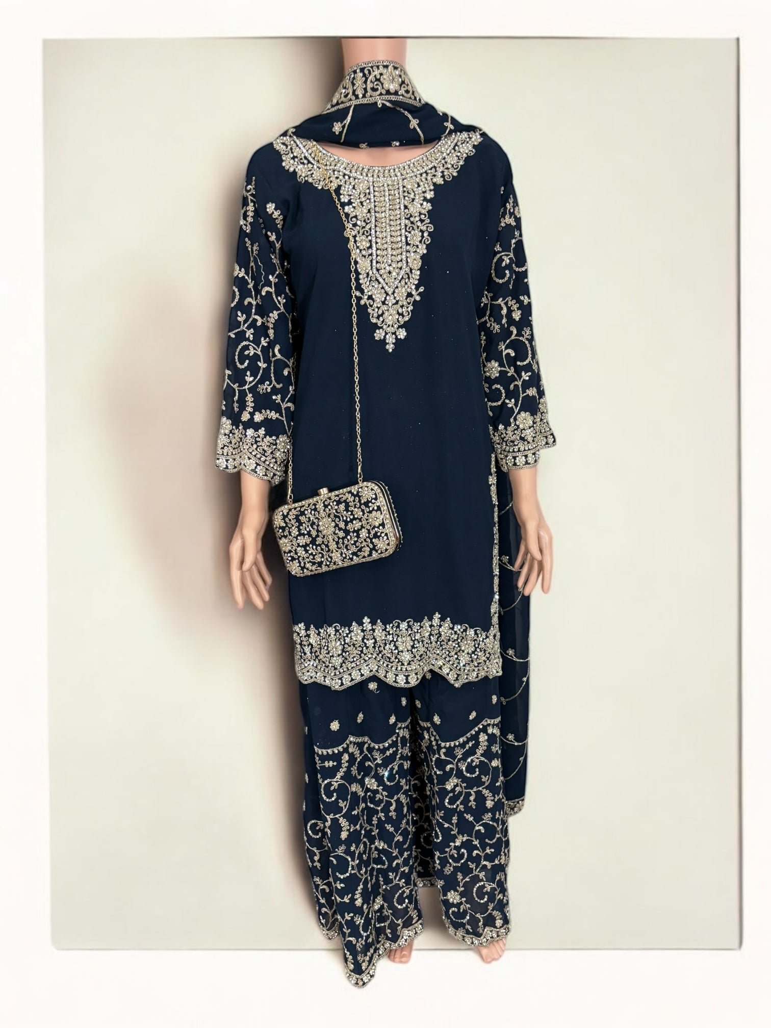 Navy blue traditional designer Salwar Kameez suit with matching handbag, ethnic wear for women by Saree Ghor Charlotte.