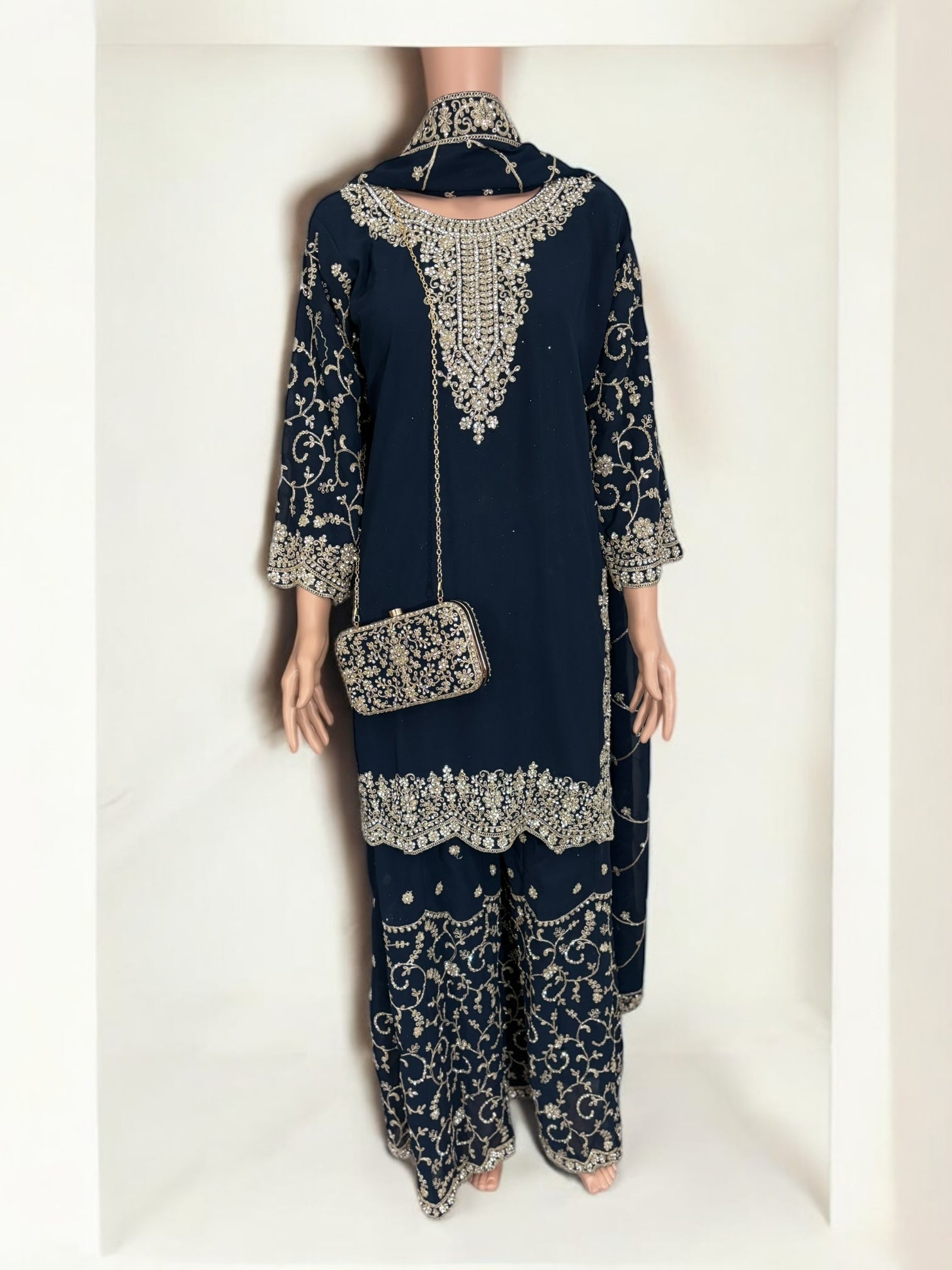 Navy blue traditional designer Salwar Kameez suit with matching handbag, ethnic wear for women by Saree Ghor Charlotte.