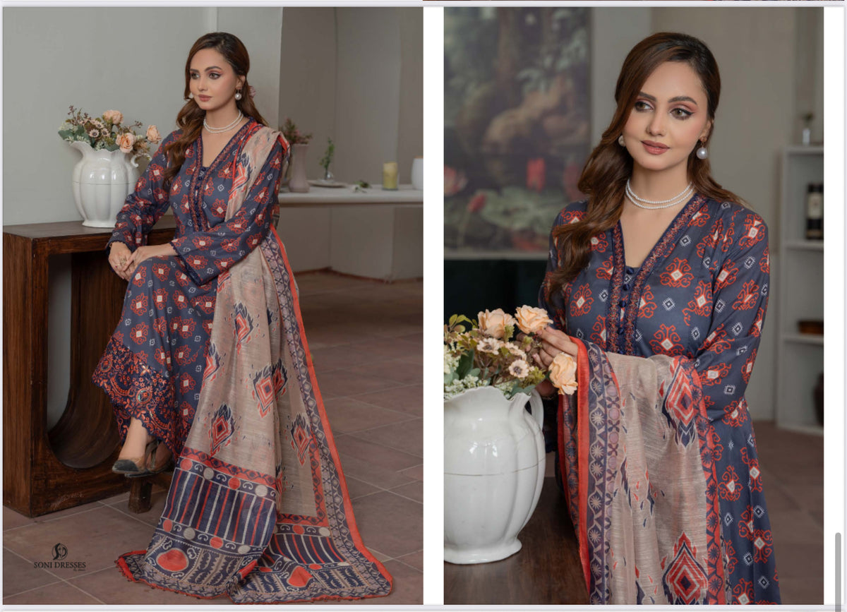 Pakistani Salwar Kameez suit by Saree Ghor Charlotte featuring traditional ethnic wear for women with intricate embroidery and vibrant colors.